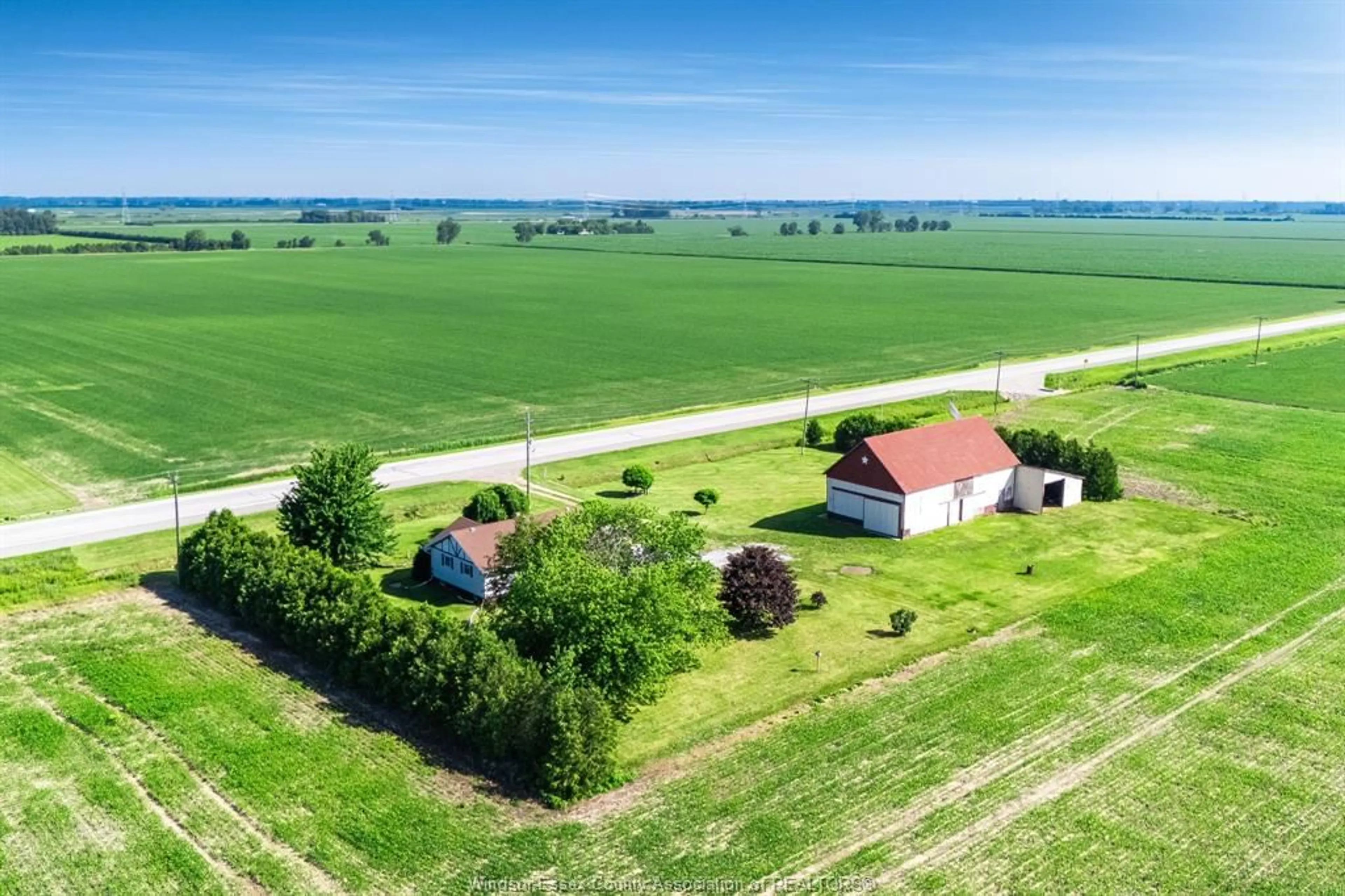A pic from outside/outdoor area/front of a property/back of a property/a pic from drone, street for 5016 Queens Line, Tilbury Ontario N0P 2L0