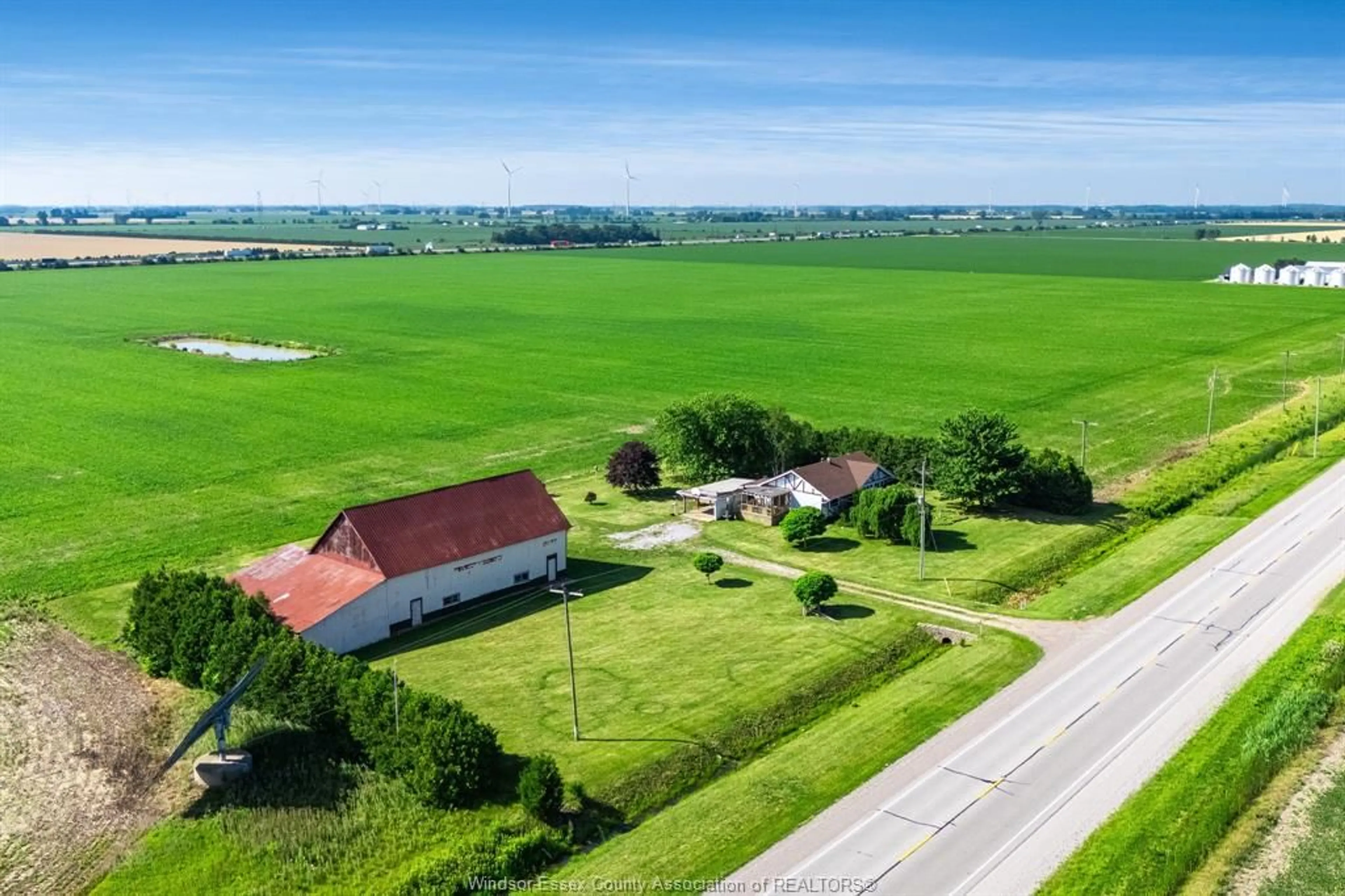 A pic from outside/outdoor area/front of a property/back of a property/a pic from drone, street for 5016 Queens Line, Tilbury Ontario N0P 2L0
