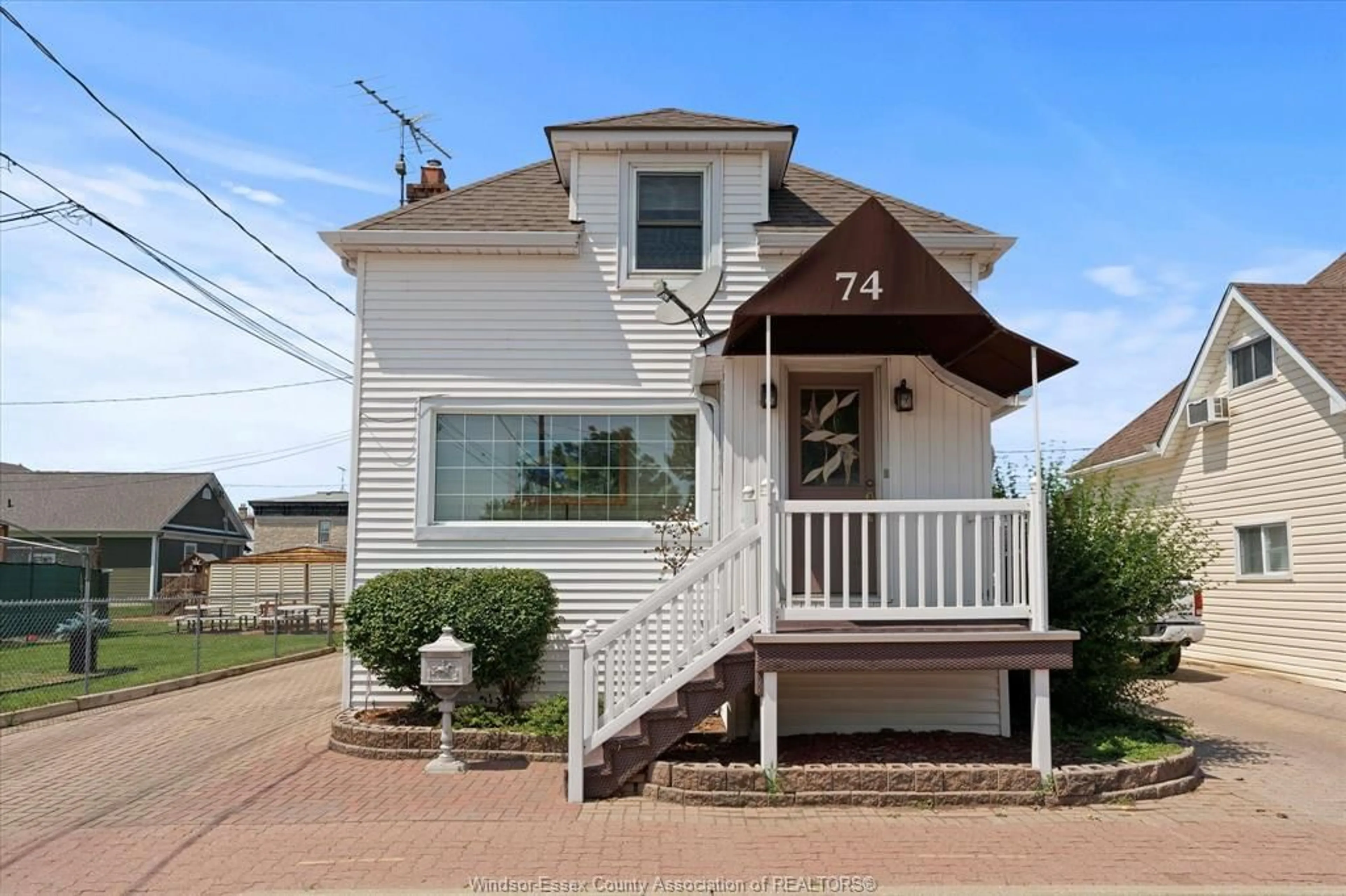 Home with vinyl exterior material, street for 74 GORE St, Amherstburg Ontario N9V 1K4