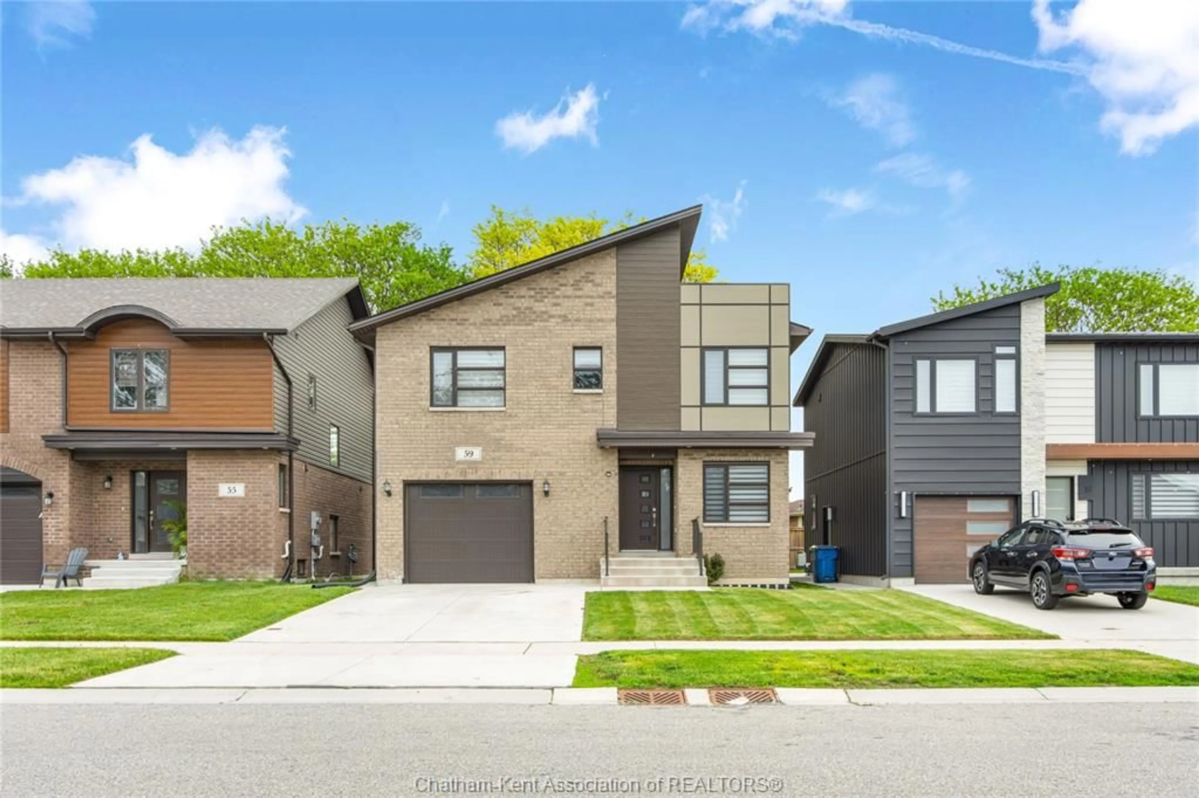 Home with brick exterior material, street for 59 CHURCHILL PARK Rd, Chatham Ontario N7M 0R8
