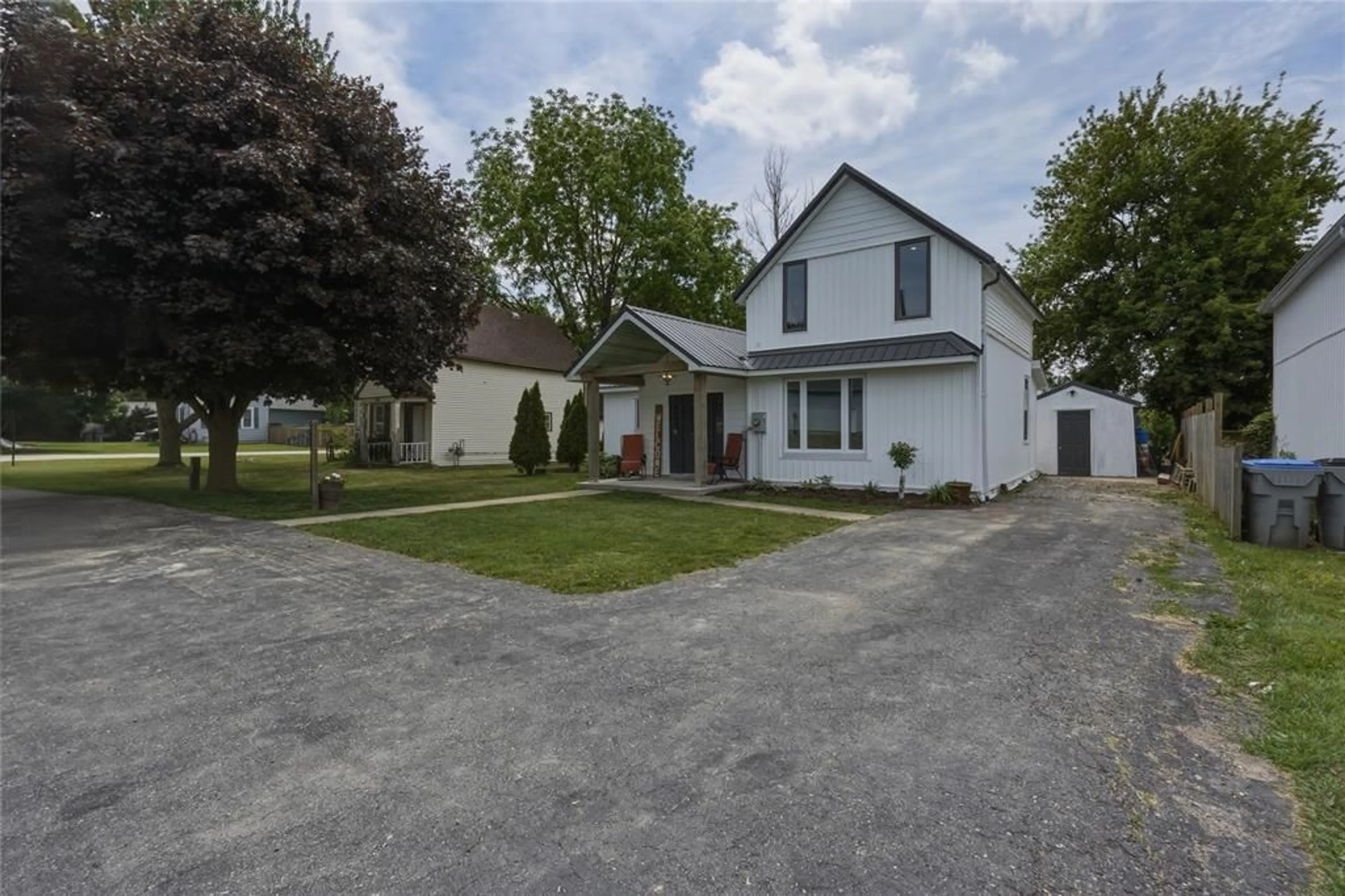 A pic from outside/outdoor area/front of a property/back of a property/a pic from drone, street for 8073 Francis St, Brooke-Alvinston Ontario N0N 1A0