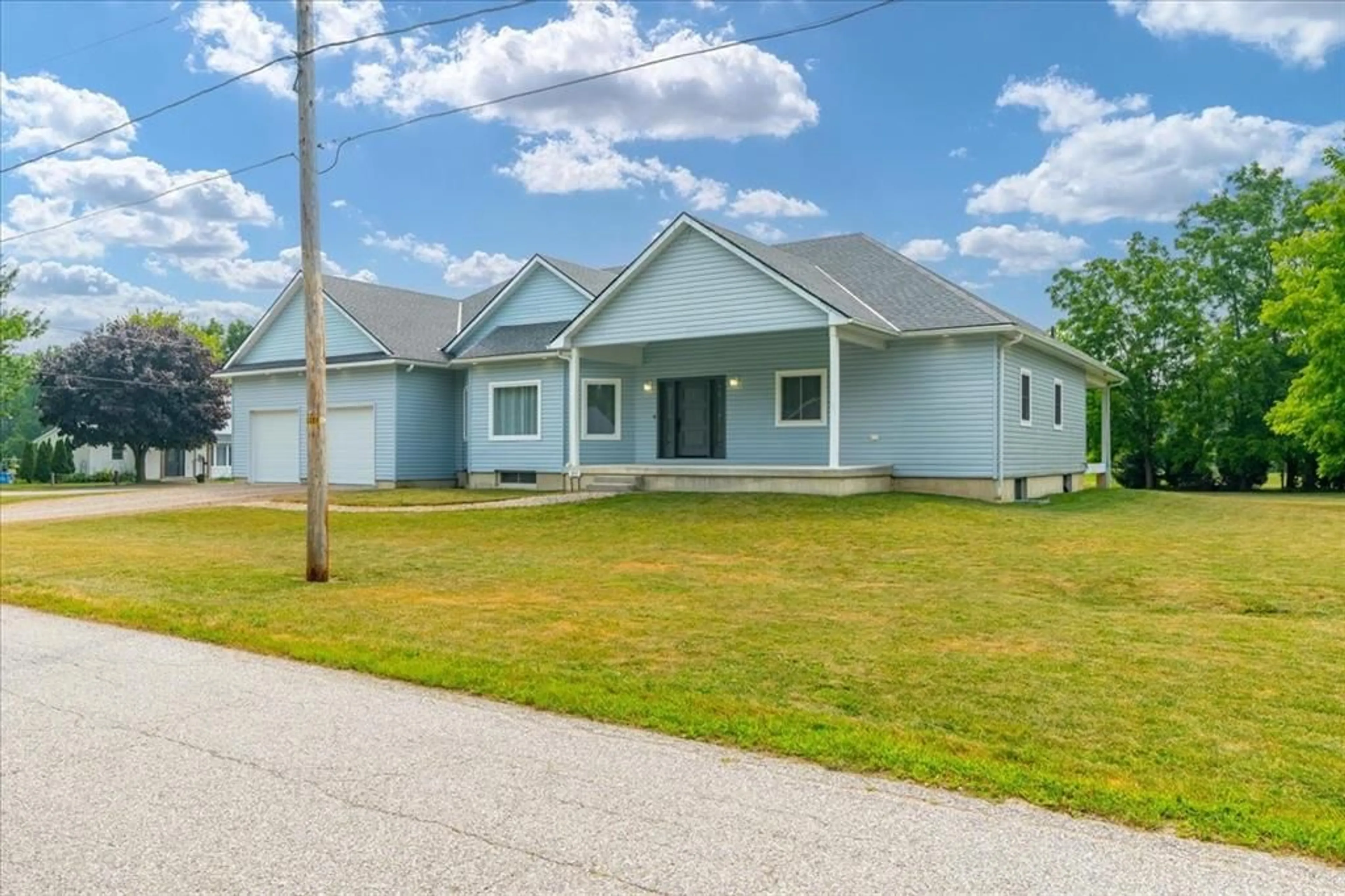 Home with vinyl exterior material, street for 3167 BROADWAY St, Brooke-Alvinston Ontario N0N 1A0