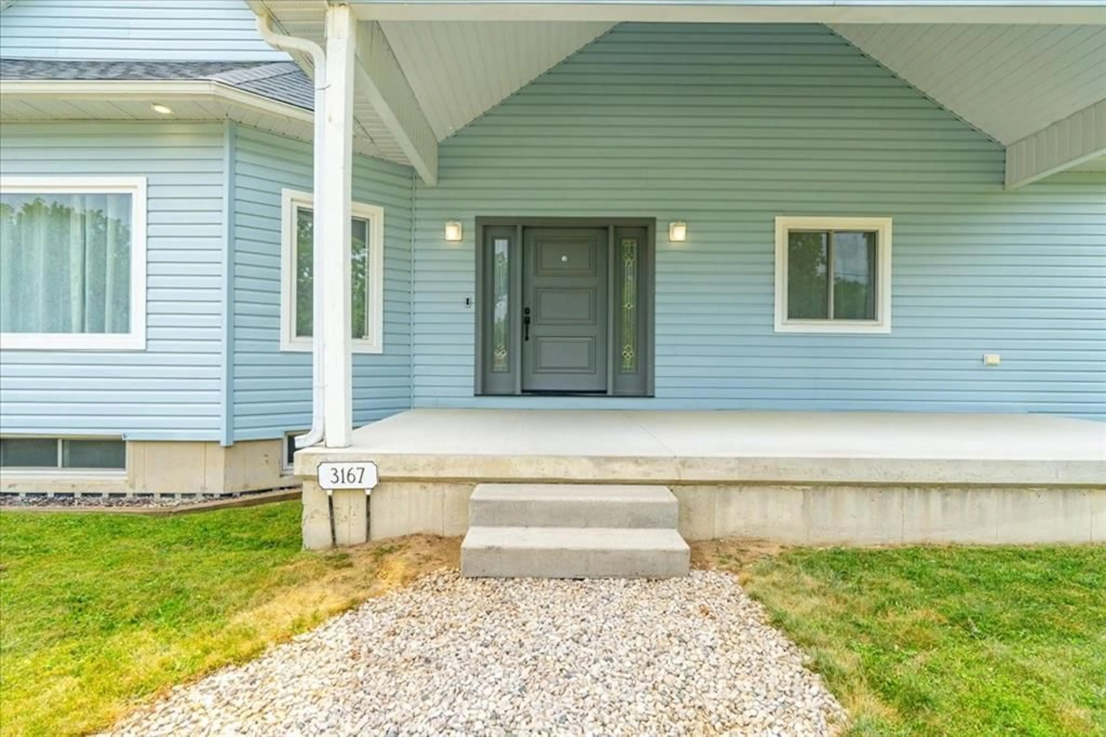 Home with vinyl exterior material, street for 3167 BROADWAY St, Brooke-Alvinston Ontario N0N 1A0
