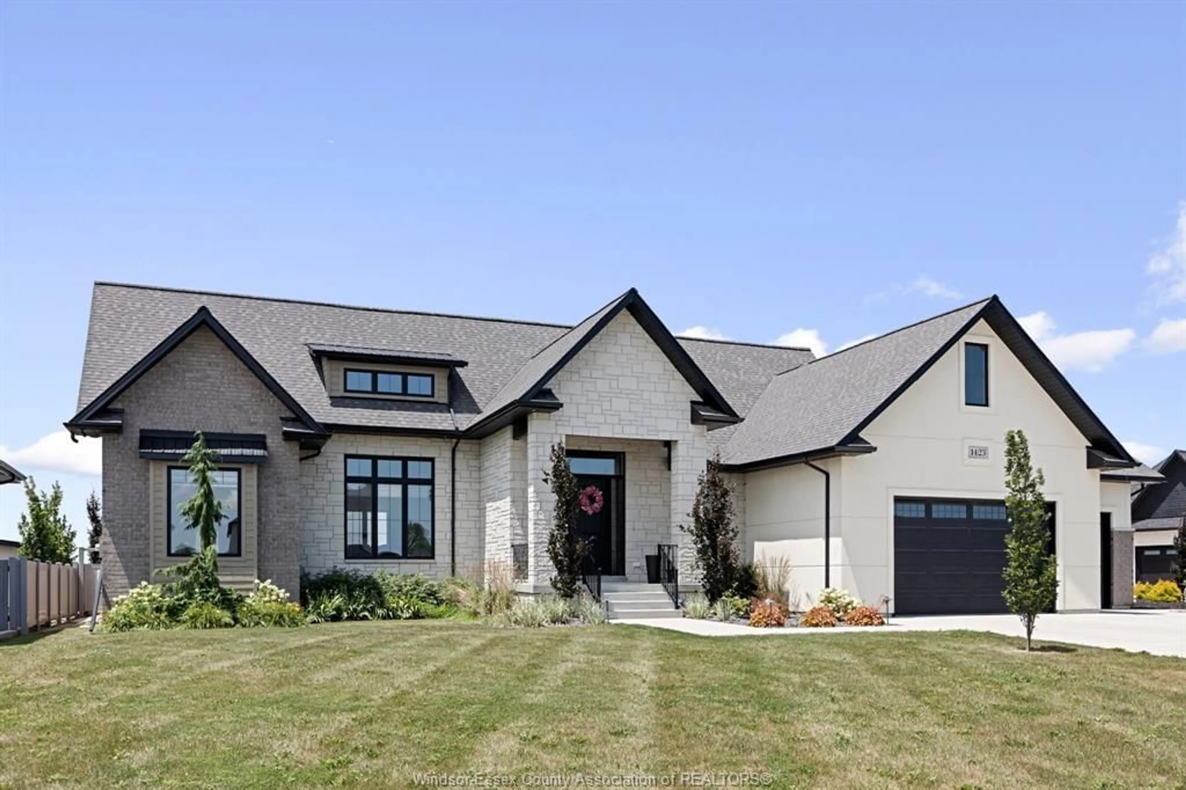Home with brick exterior material, unknown for 1423 MULLINS Dr, Lakeshore Ontario N0R 1V0