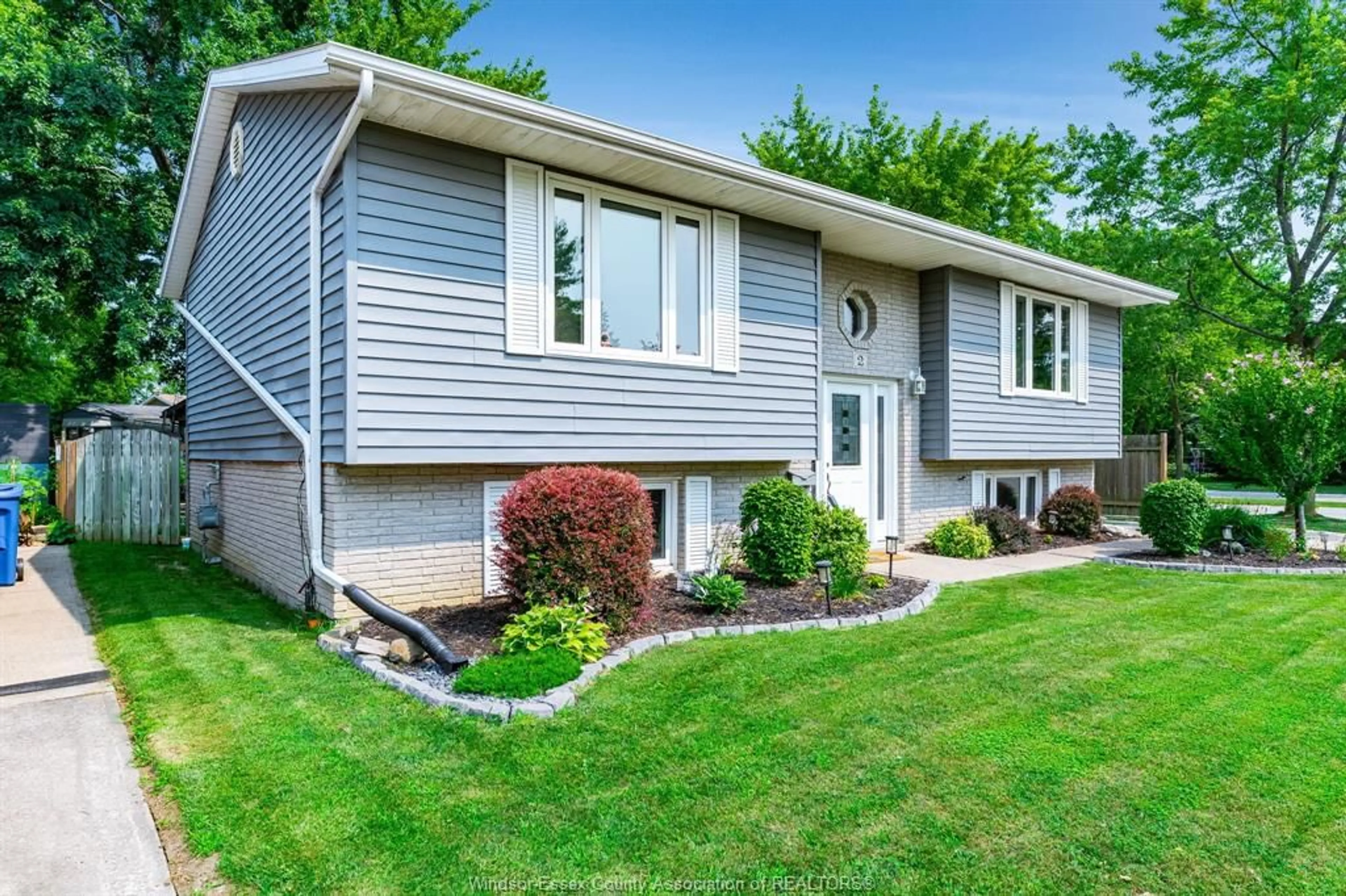 Home with vinyl exterior material, street for 2 Kingsway Crt, Essex Ontario N8M 3C2