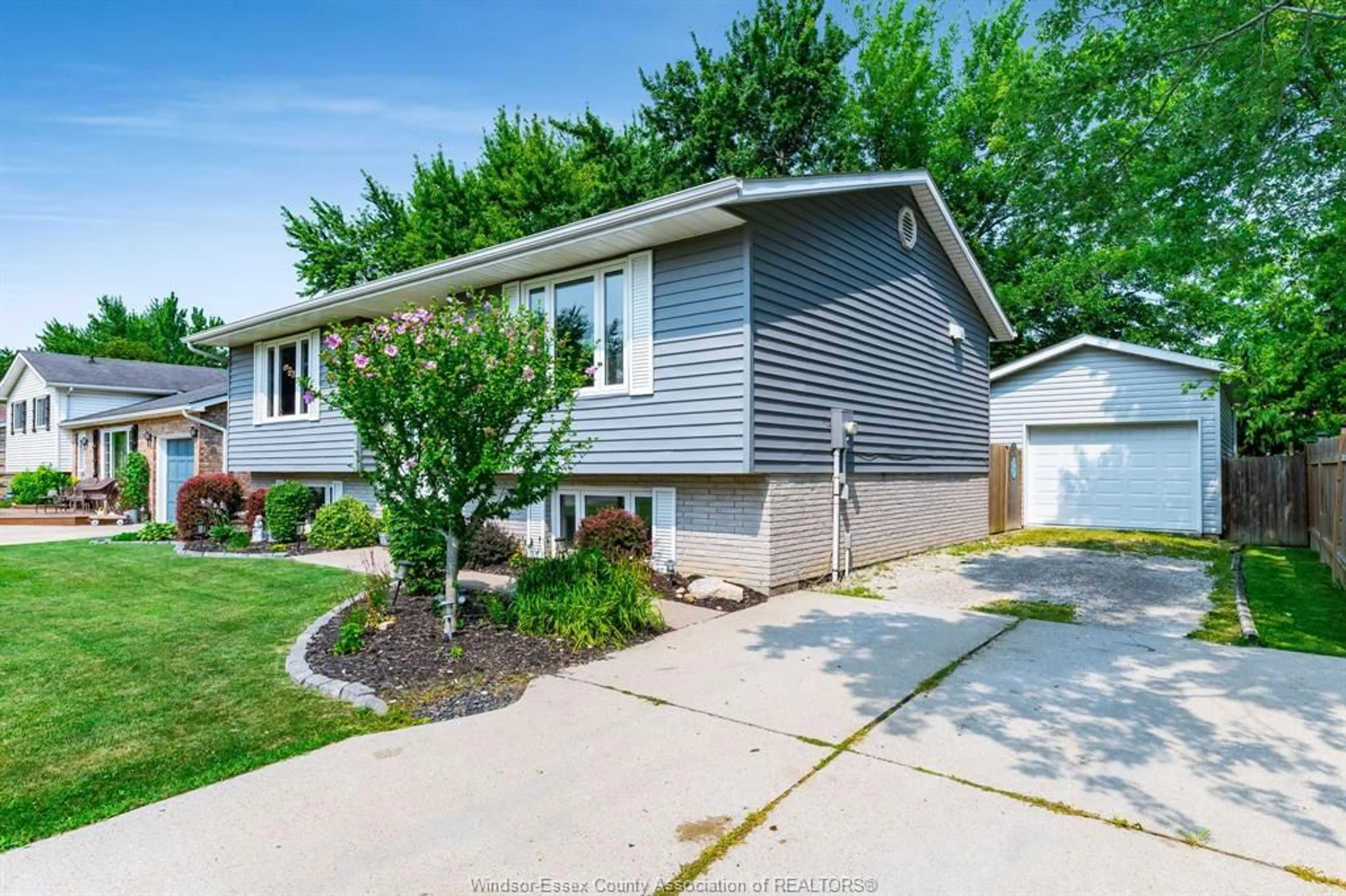 Home with vinyl exterior material, street for 2 Kingsway Crt, Essex Ontario N8M 3C2