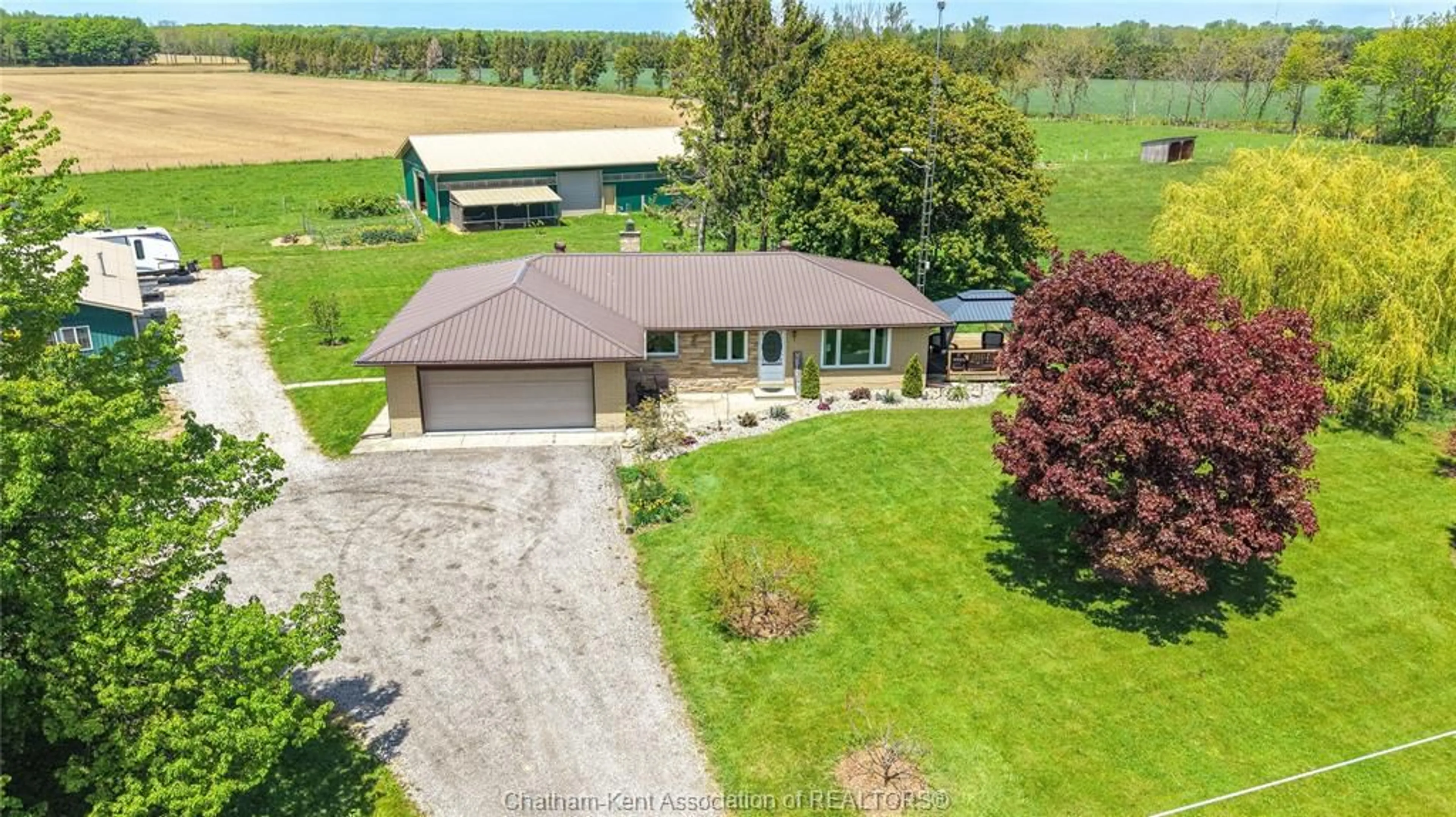 A pic from outside/outdoor area/front of a property/back of a property/a pic from drone, unknown for 7527 TALBOT Trail, Blenheim Ontario N0P 1A0