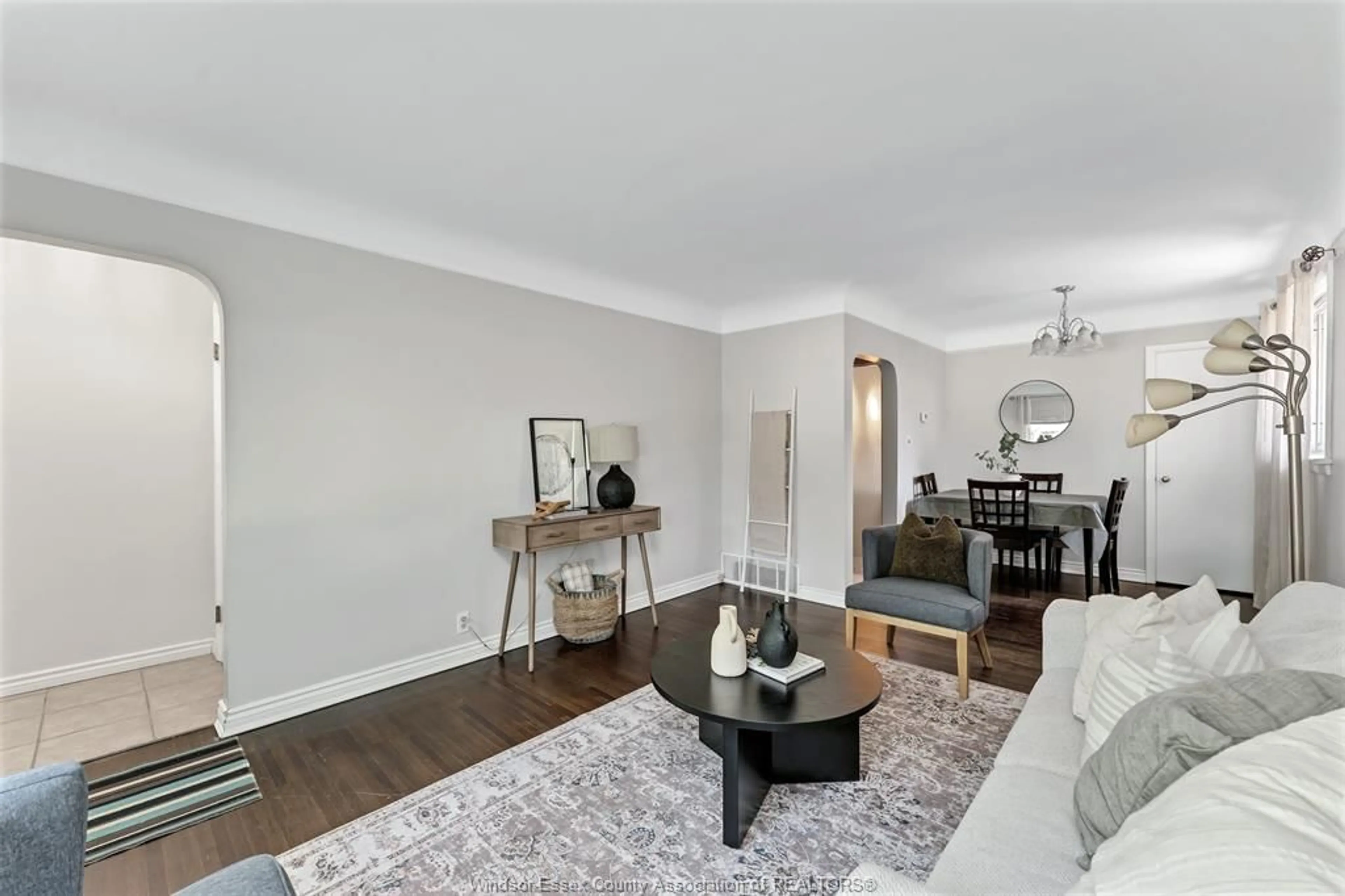 Living room with furniture, wood/laminate floor for 3668 MCKAY, Windsor Ontario N9E 2S2