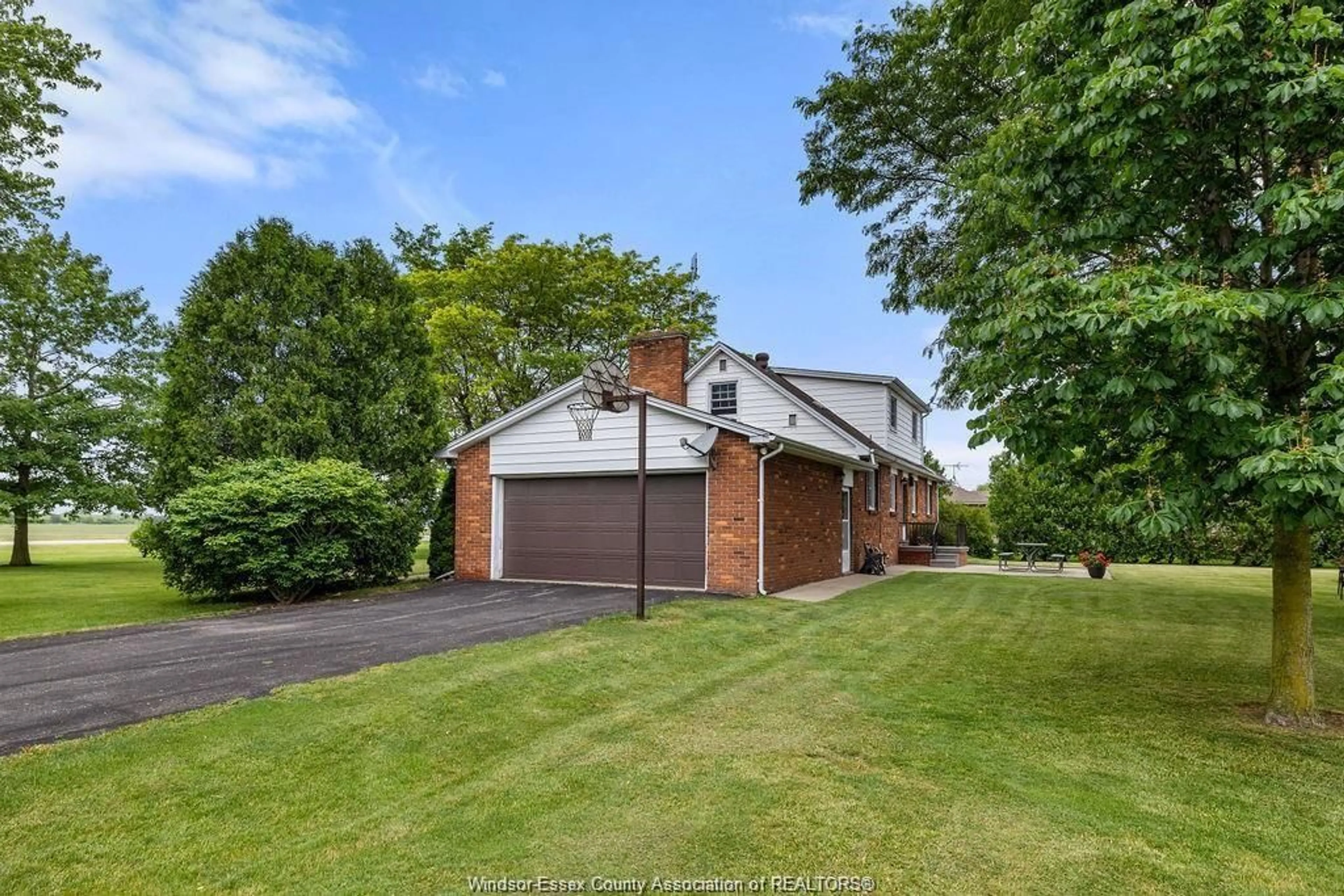 A pic from outside/outdoor area/front of a property/back of a property/a pic from drone, street for 750 LAKESHORE RD 103, Lakeshore Ontario N0R 1K0