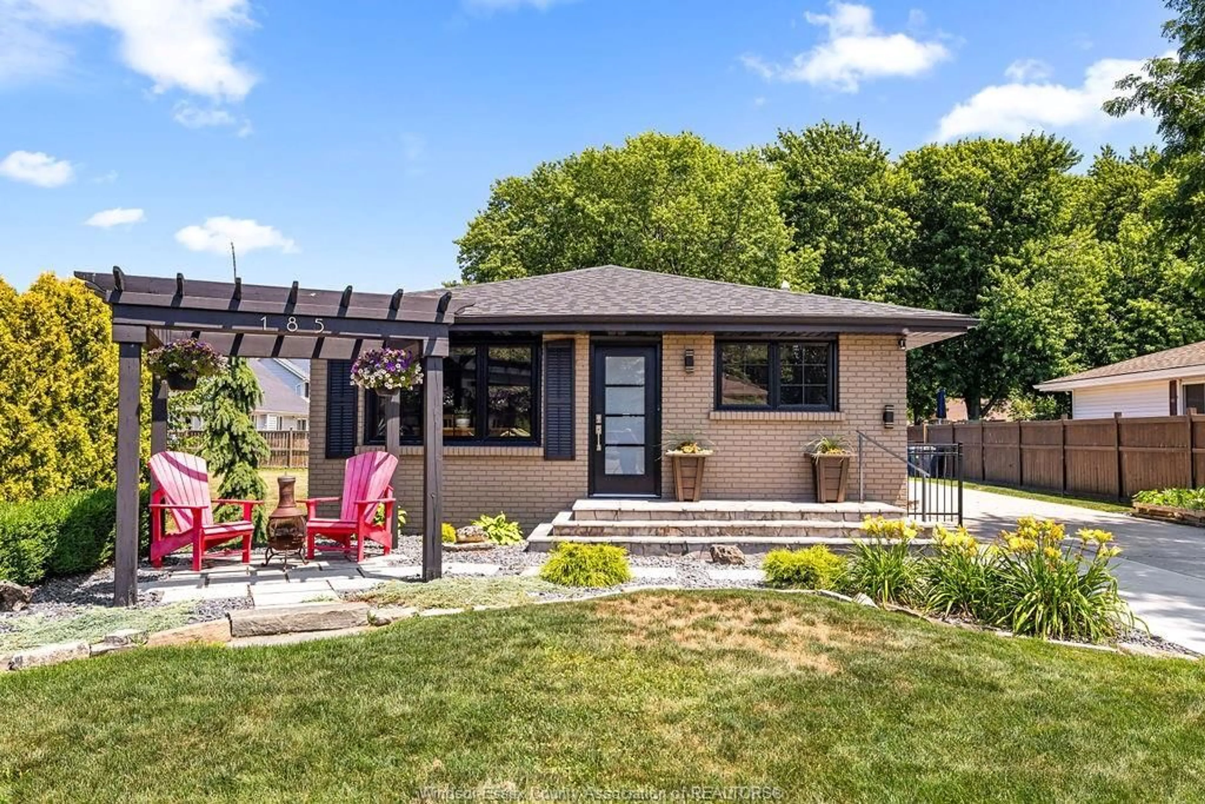 Home with brick exterior material, street for 185 DUCHARME Rd, Lakeshore Ontario N0R 1A0