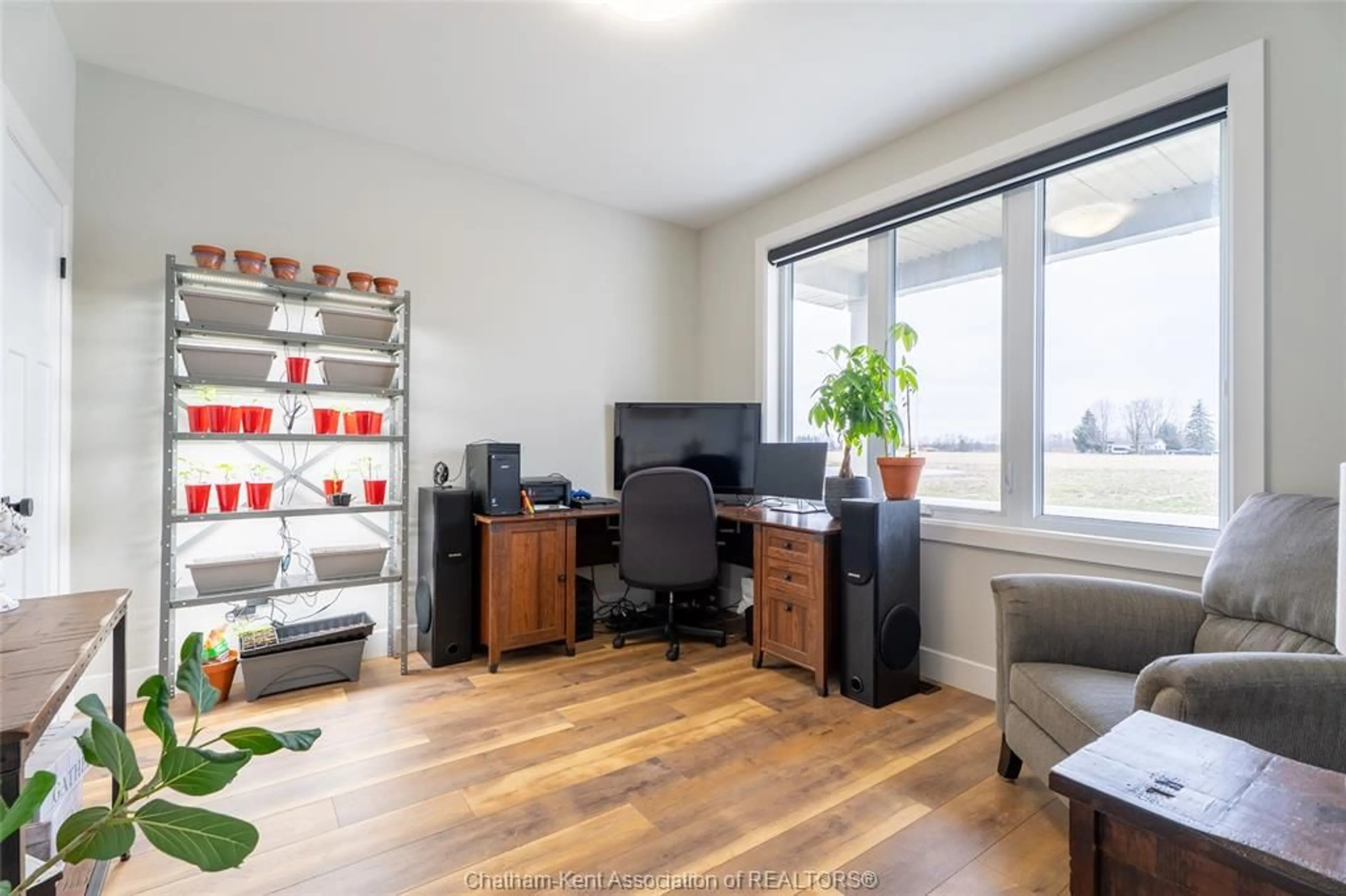Living room with furniture, wood/laminate floor for 9 HENSON St, Dresden Ontario N0P 1M0