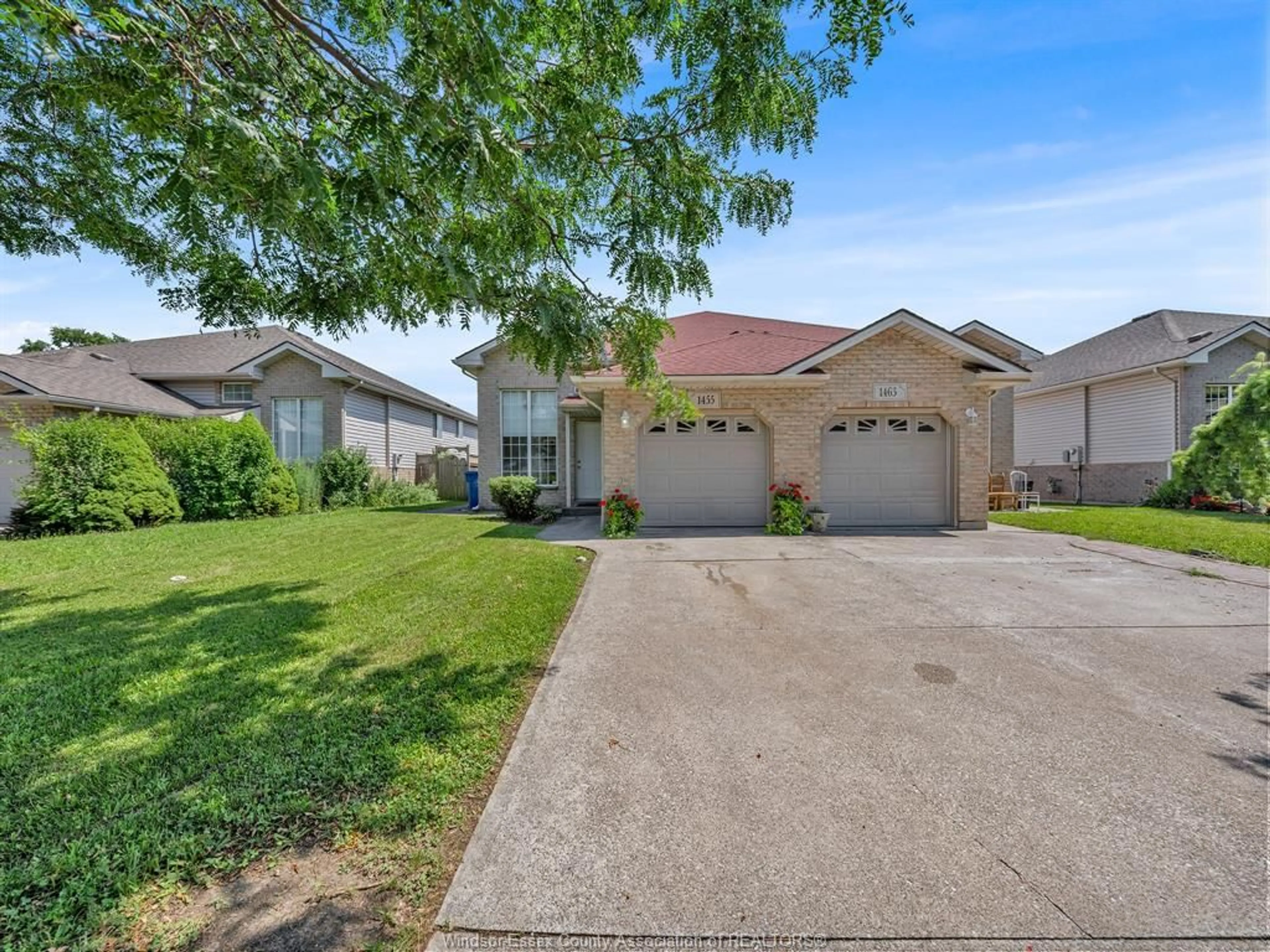 A pic from outside/outdoor area/front of a property/back of a property/a pic from drone, street for 1455 DOBRICH St, Windsor Ontario N9B 3W6