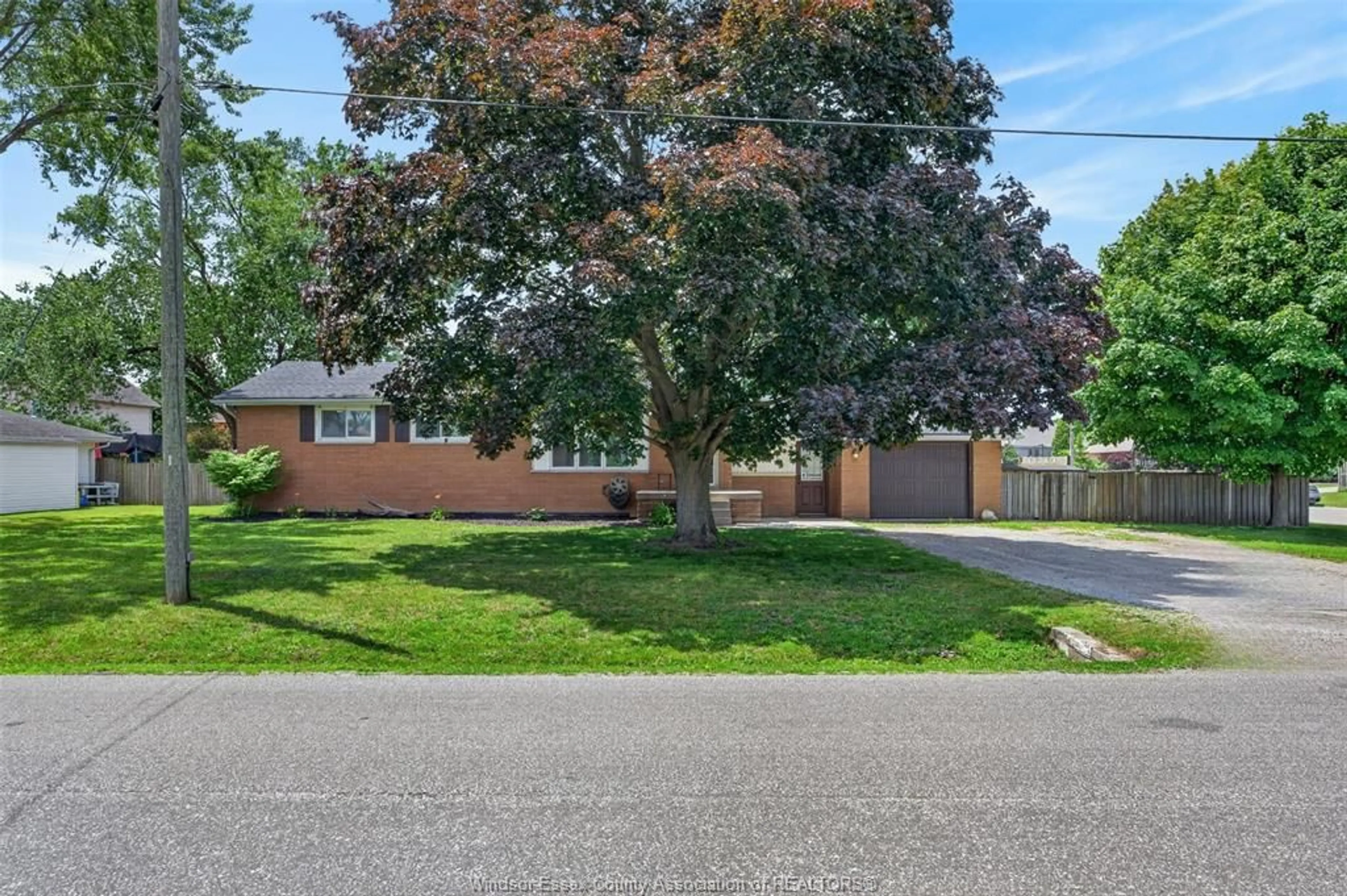 A pic from outside/outdoor area/front of a property/back of a property/a pic from drone, street for 1749 SHAWNEE, Tecumseh Ontario N8N 1S4