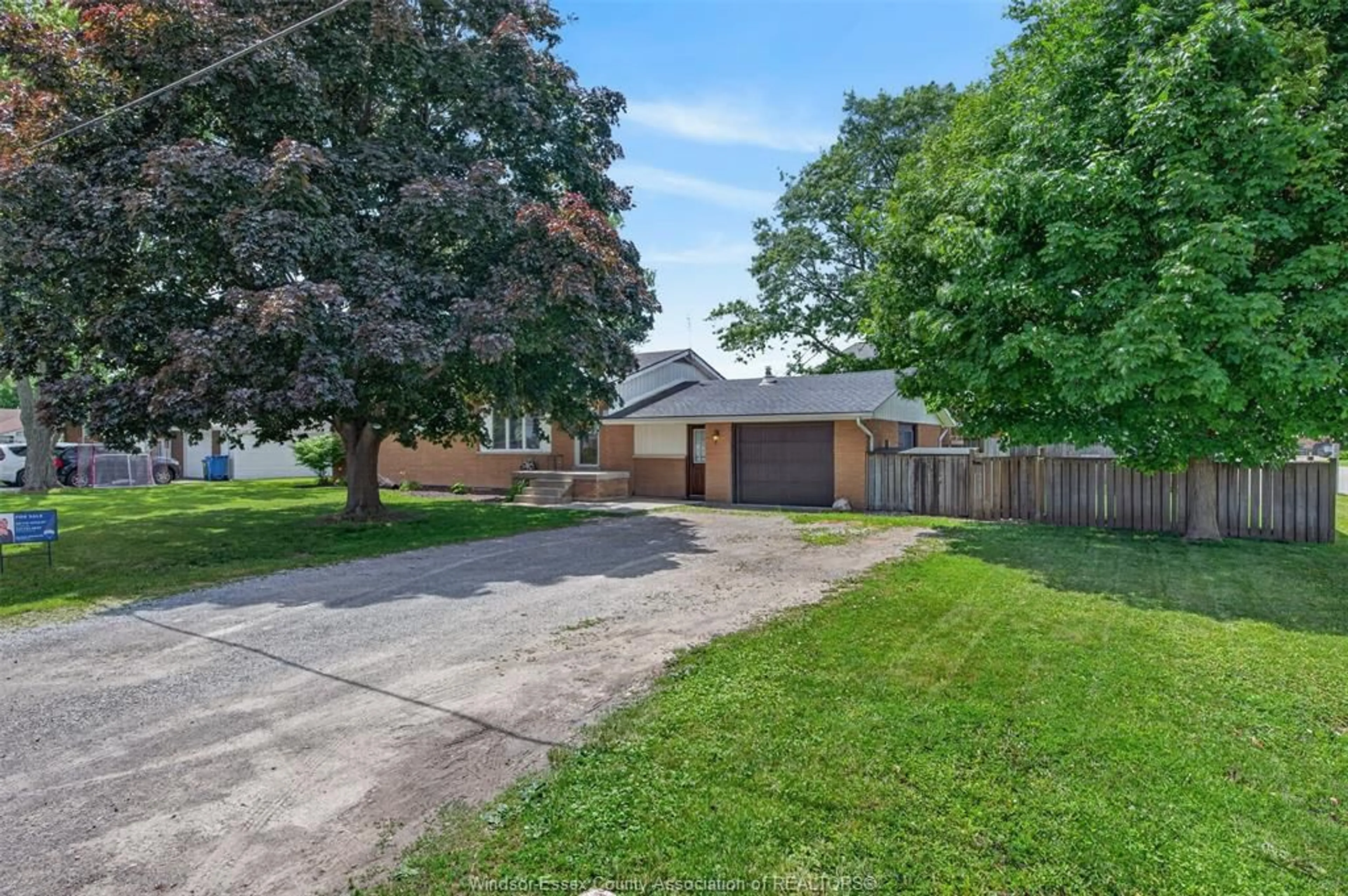 A pic from outside/outdoor area/front of a property/back of a property/a pic from drone, street for 1749 SHAWNEE, Tecumseh Ontario N8N 1S4