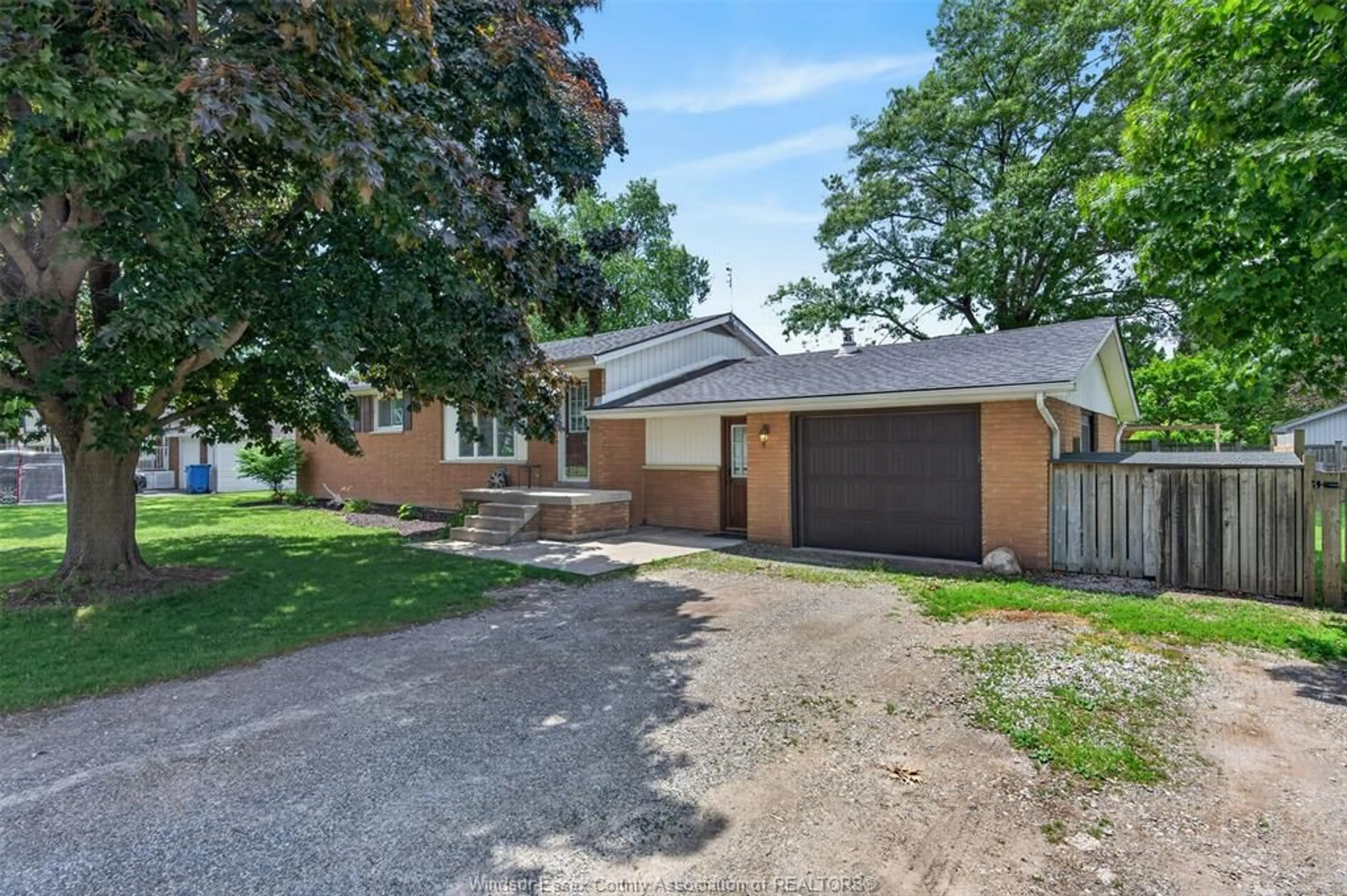A pic from outside/outdoor area/front of a property/back of a property/a pic from drone, street for 1749 SHAWNEE, Tecumseh Ontario N8N 1S4