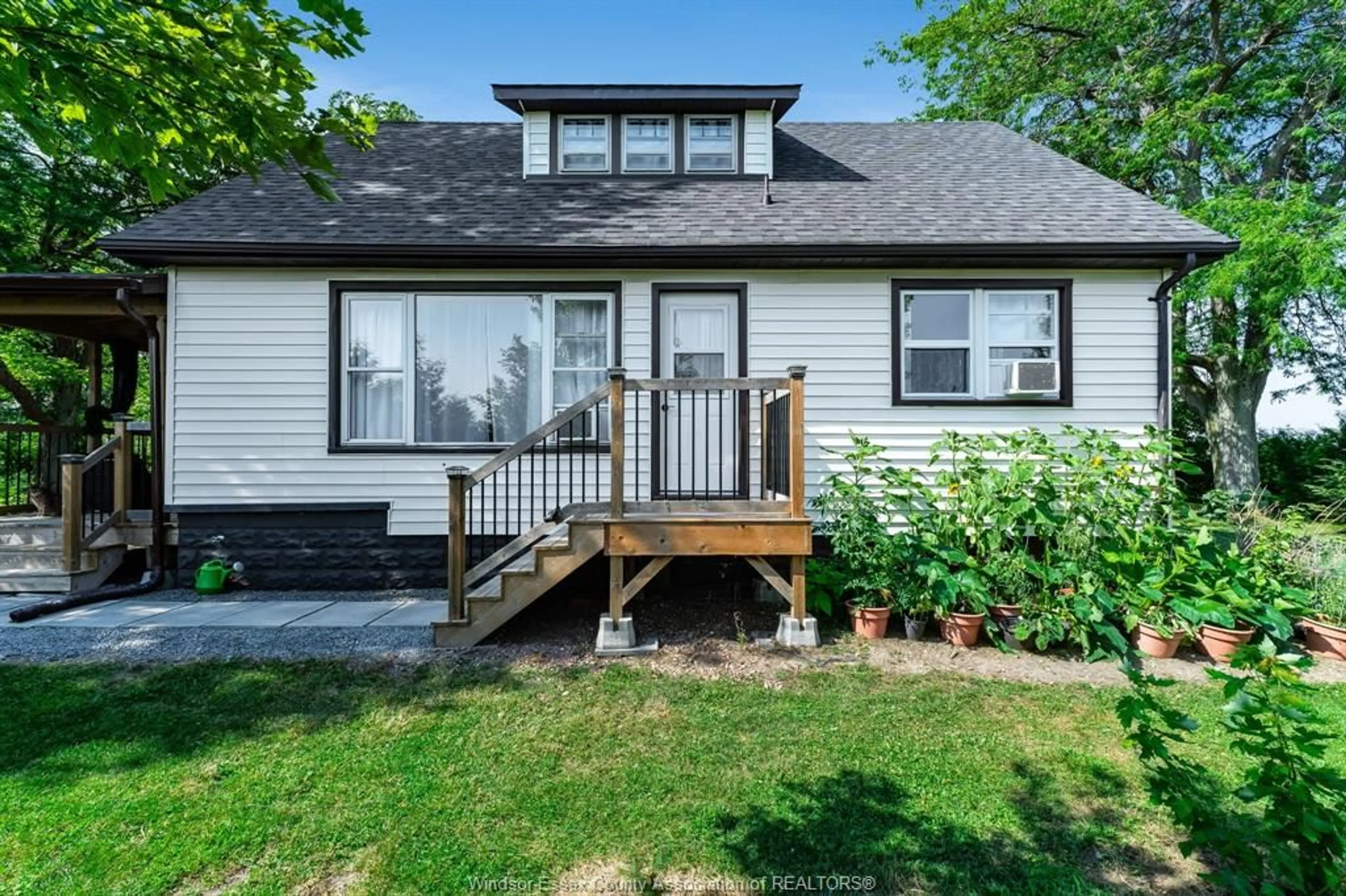 Home with vinyl exterior material, street for 451 Road 10, Gosfield North Ontario N0R 1B0