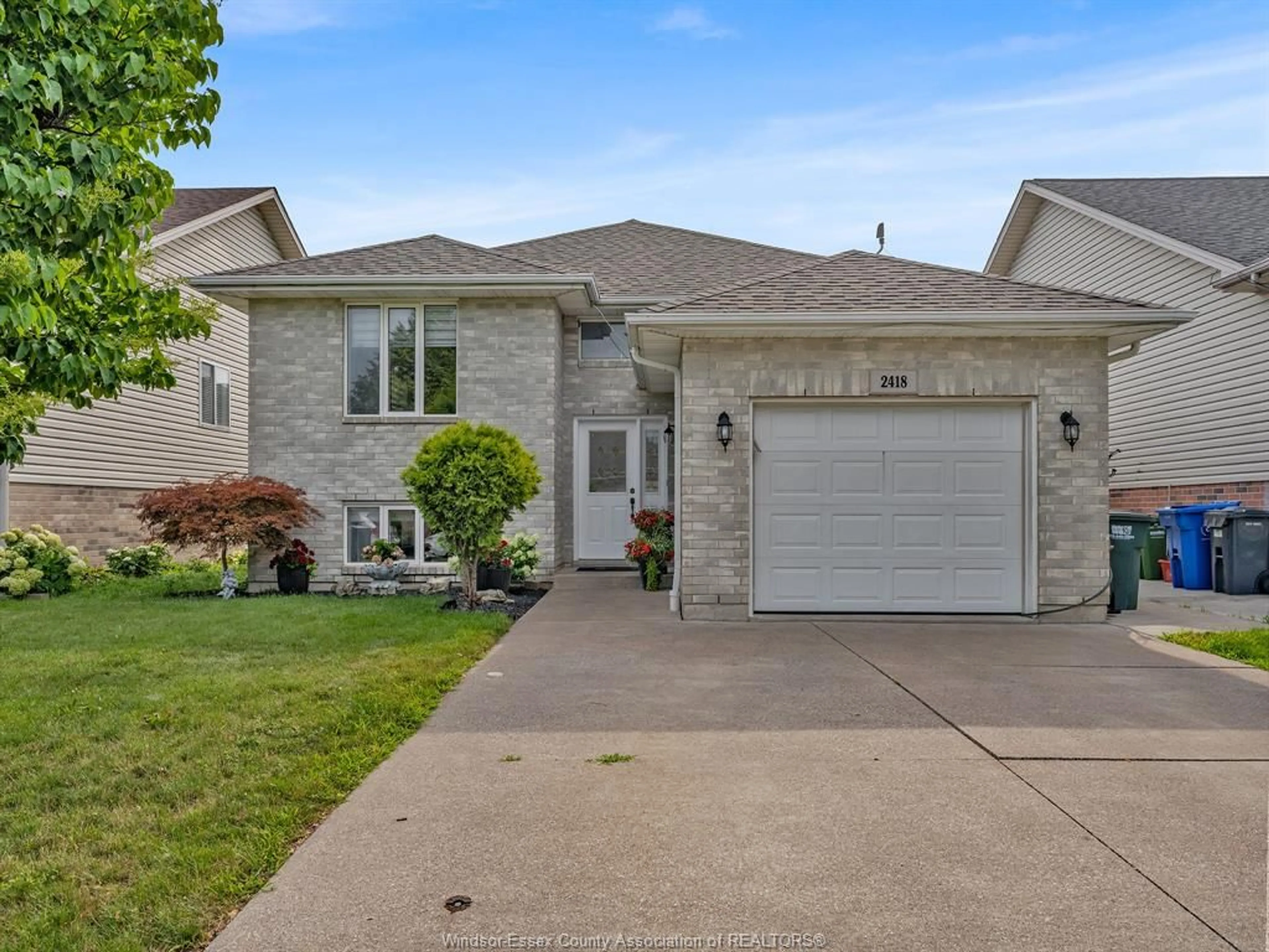 Home with brick exterior material, street for 2418 DUNESHILL Ave, Windsor Ontario N8P 1Y2