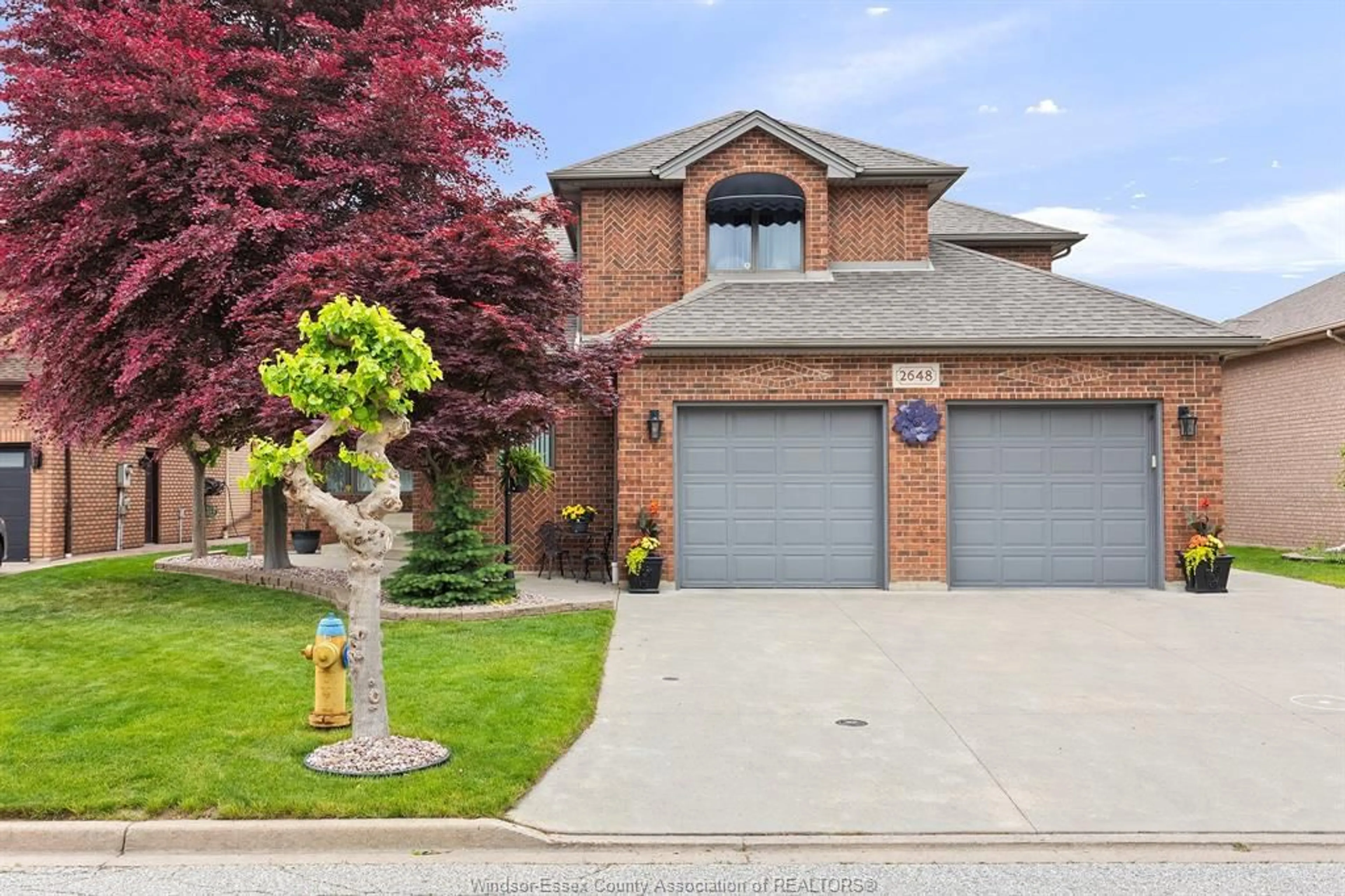 Home with brick exterior material, street for 2648 FLEMING, Windsor Ontario N9E 4P1