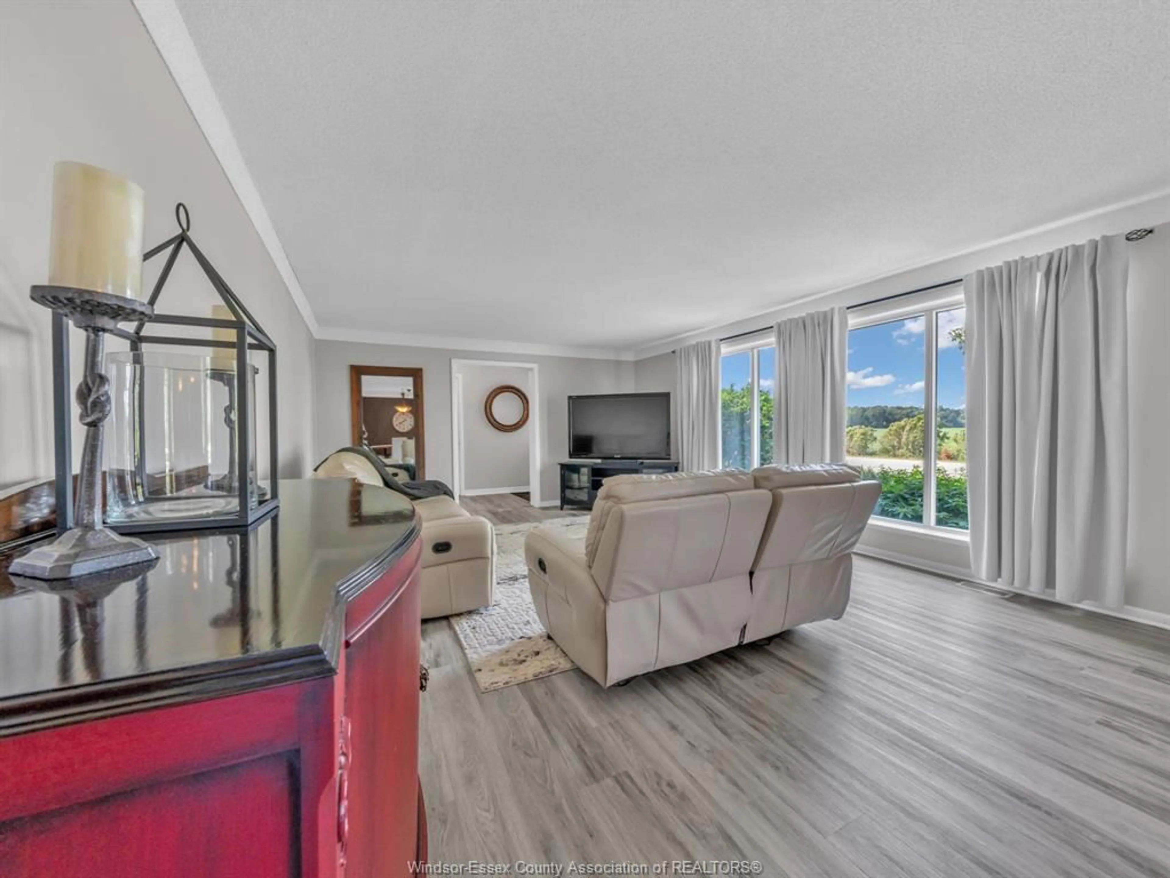 Living room with furniture, unknown for 7695 County Rd 18, Essex Ontario N0R 1B0