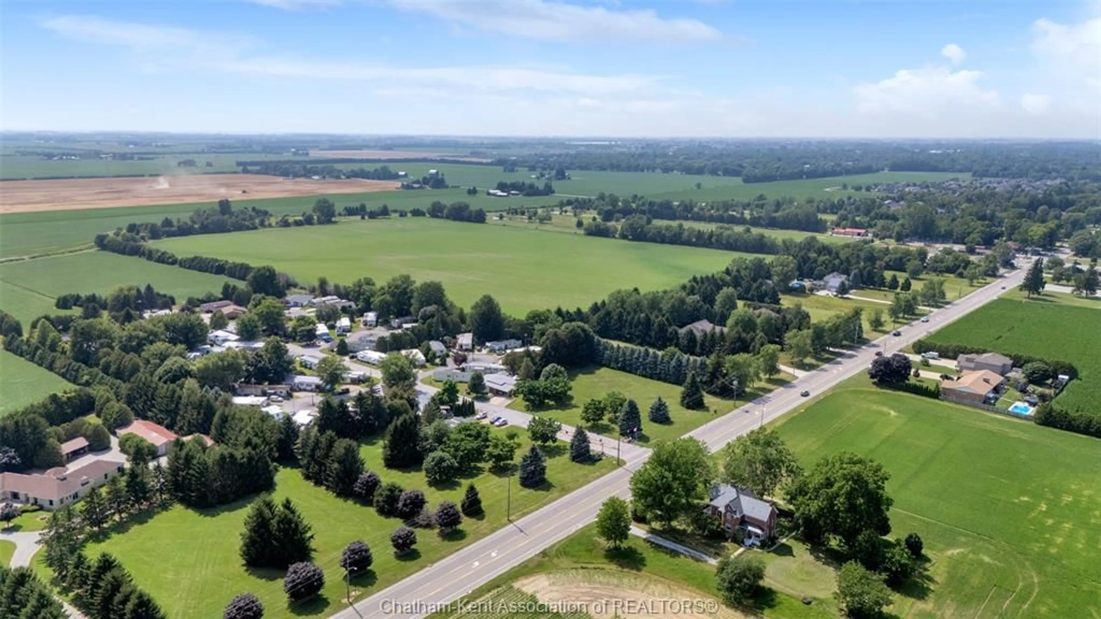 A pic from outside/outdoor area/front of a property/back of a property/a pic from drone, mountain view for 22220 Charing Cross Rd #21, Chatham Ontario N7M 5V8