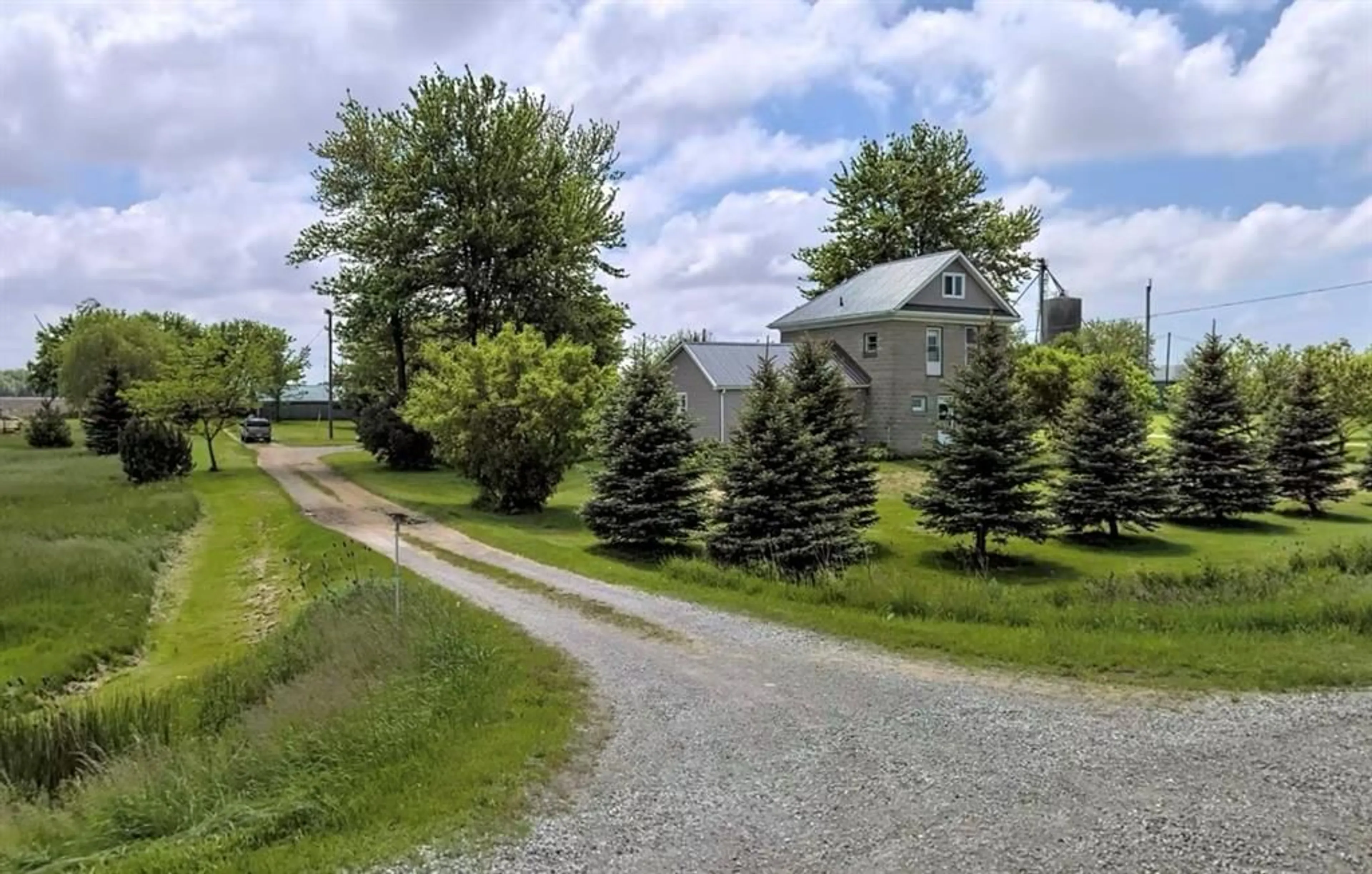 A pic from outside/outdoor area/front of a property/back of a property/a pic from drone, street for 1371 Egremont Rd, Kerwood Ontario N0M 2B0