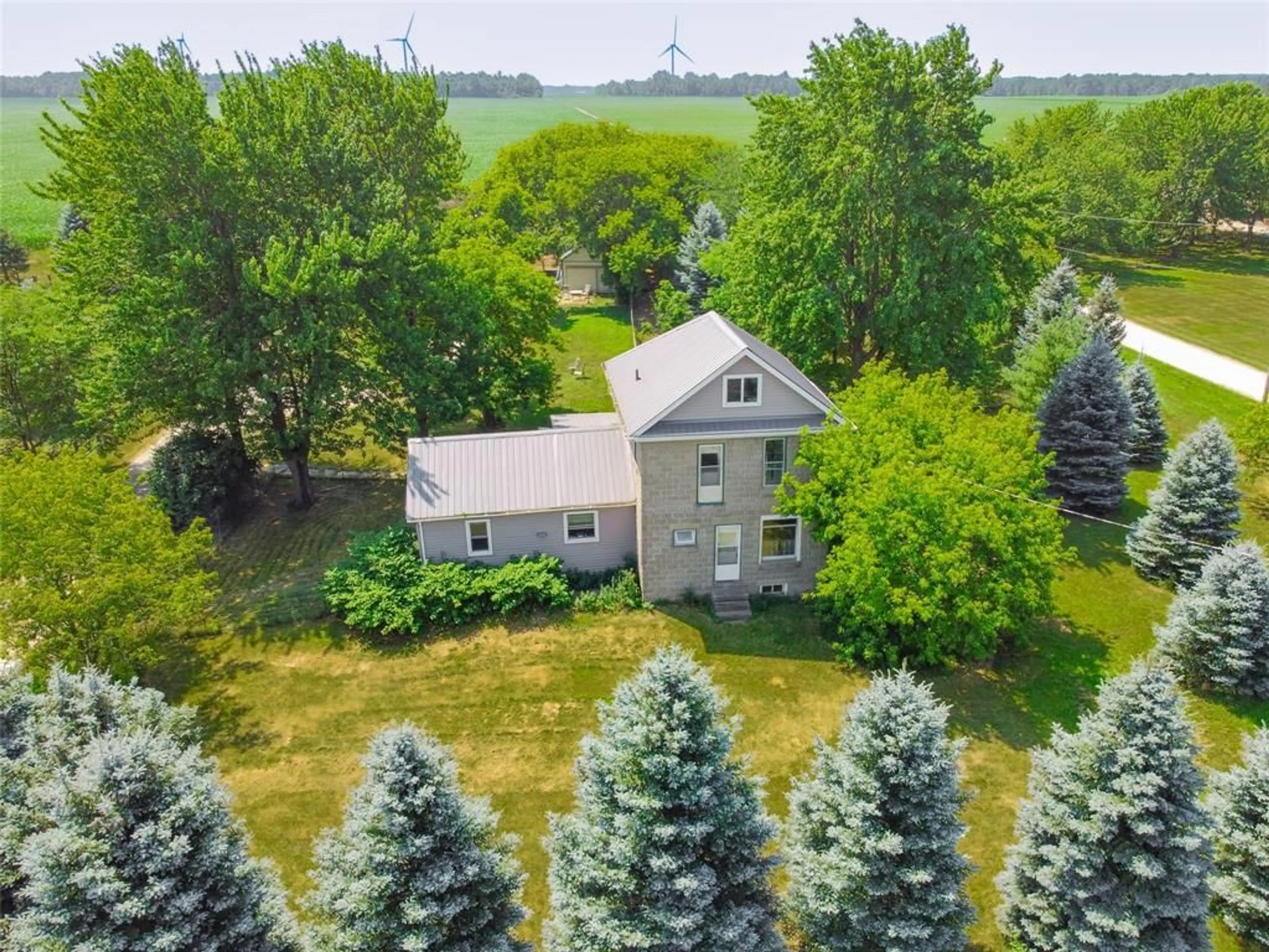A pic from outside/outdoor area/front of a property/back of a property/a pic from drone, water/lake/river/ocean view for 1371 Egremont Rd, Kerwood Ontario N0M 2B0
