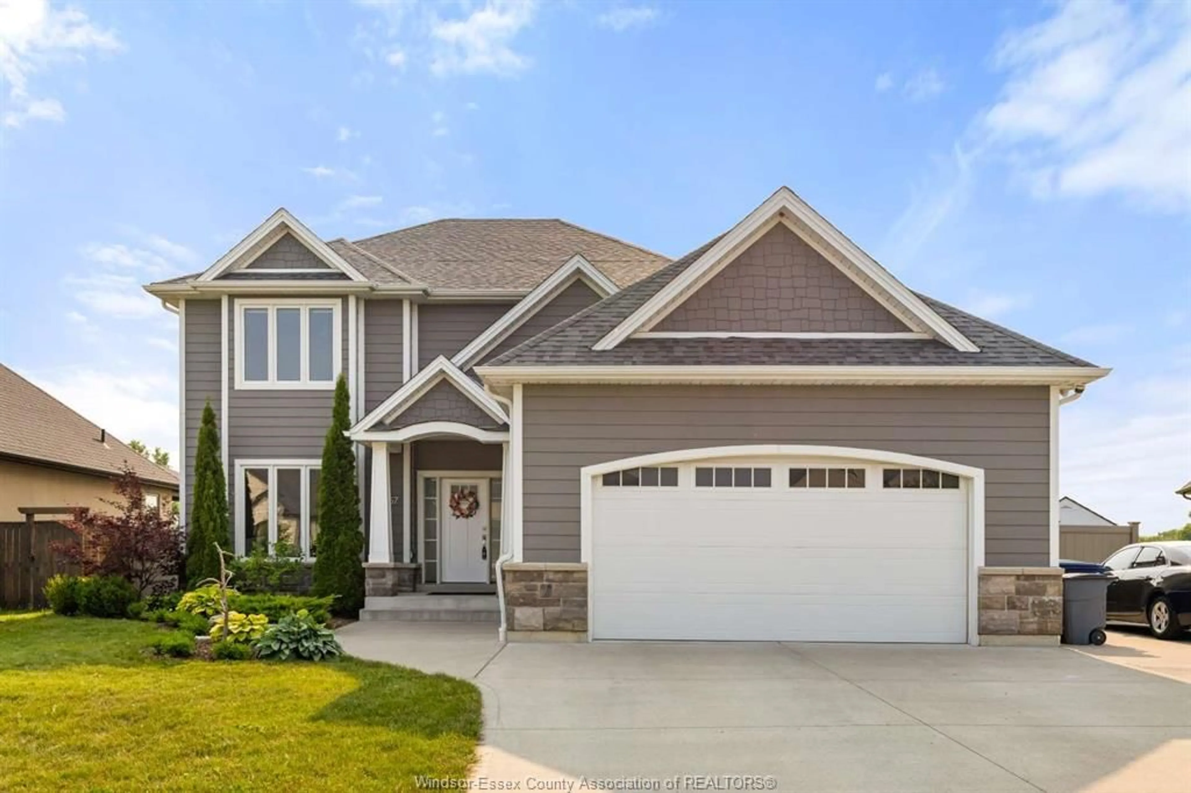 Home with vinyl exterior material, street for 557 CHATEAU Ave, Windsor Ontario N8P 0E6