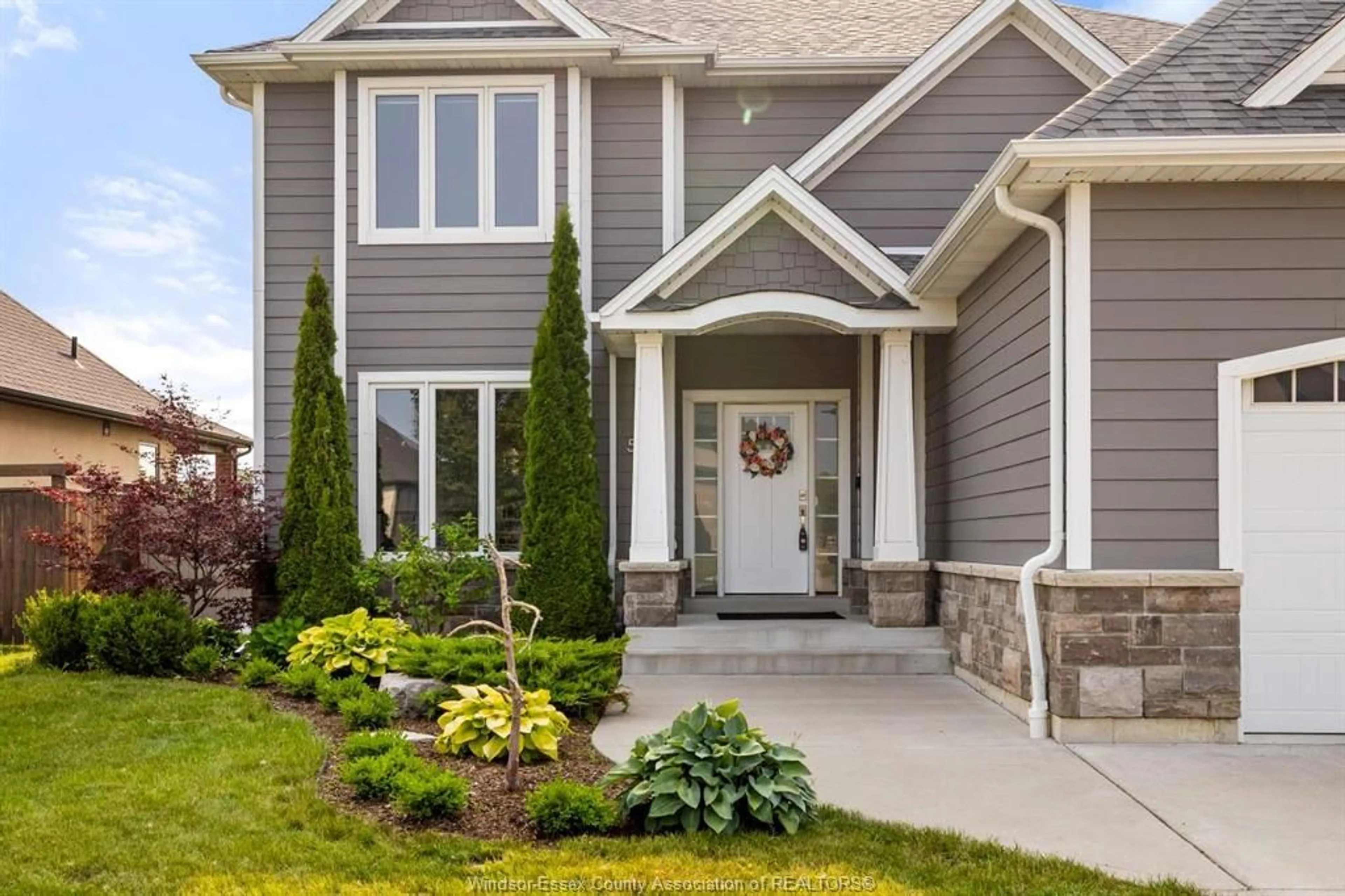Home with vinyl exterior material, street for 557 CHATEAU Ave, Windsor Ontario N8P 0E6