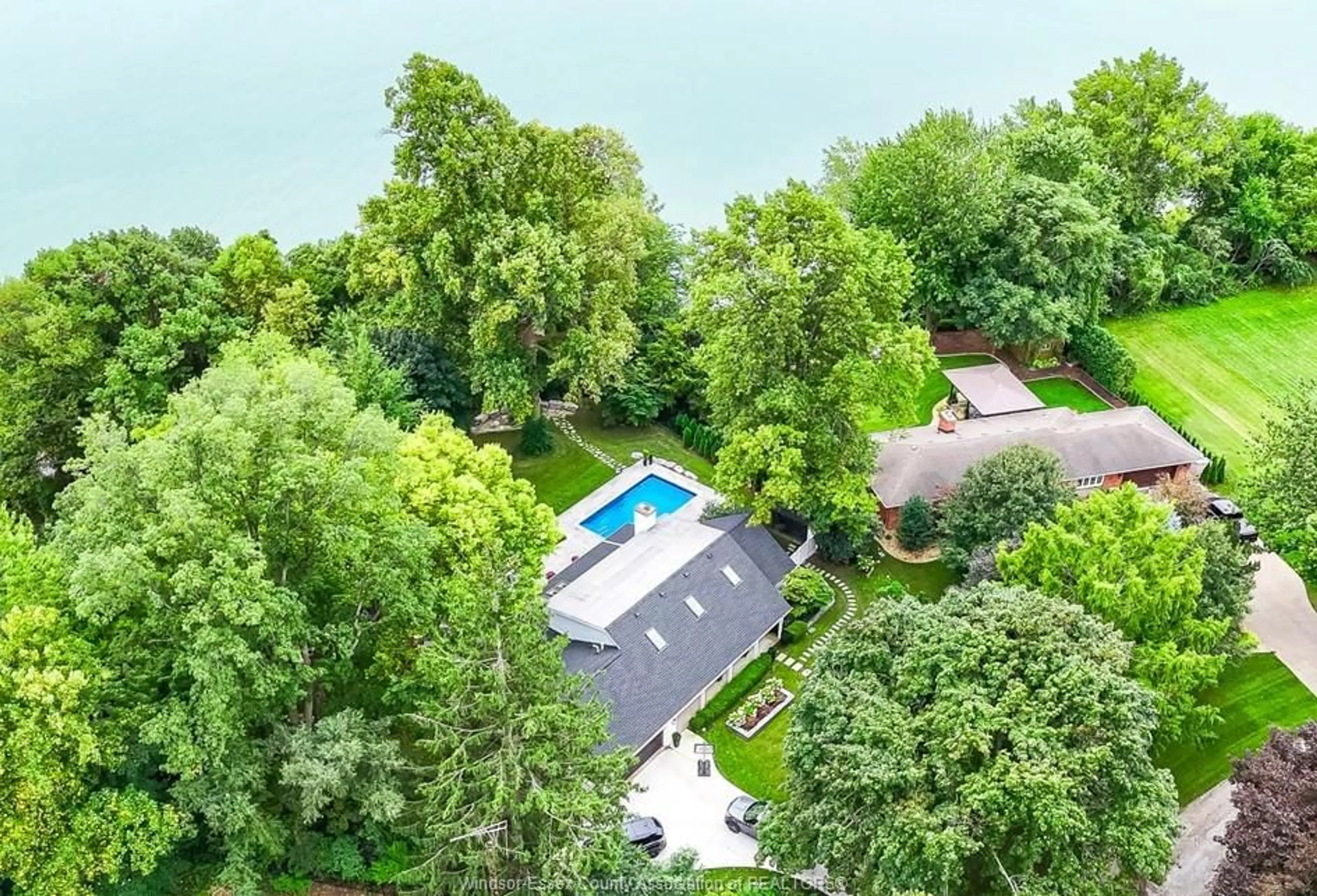 A pic from outside/outdoor area/front of a property/back of a property/a pic from drone, unknown for 3073 CENTENNIAL Cres, Kingsville Ontario N8H 4G6