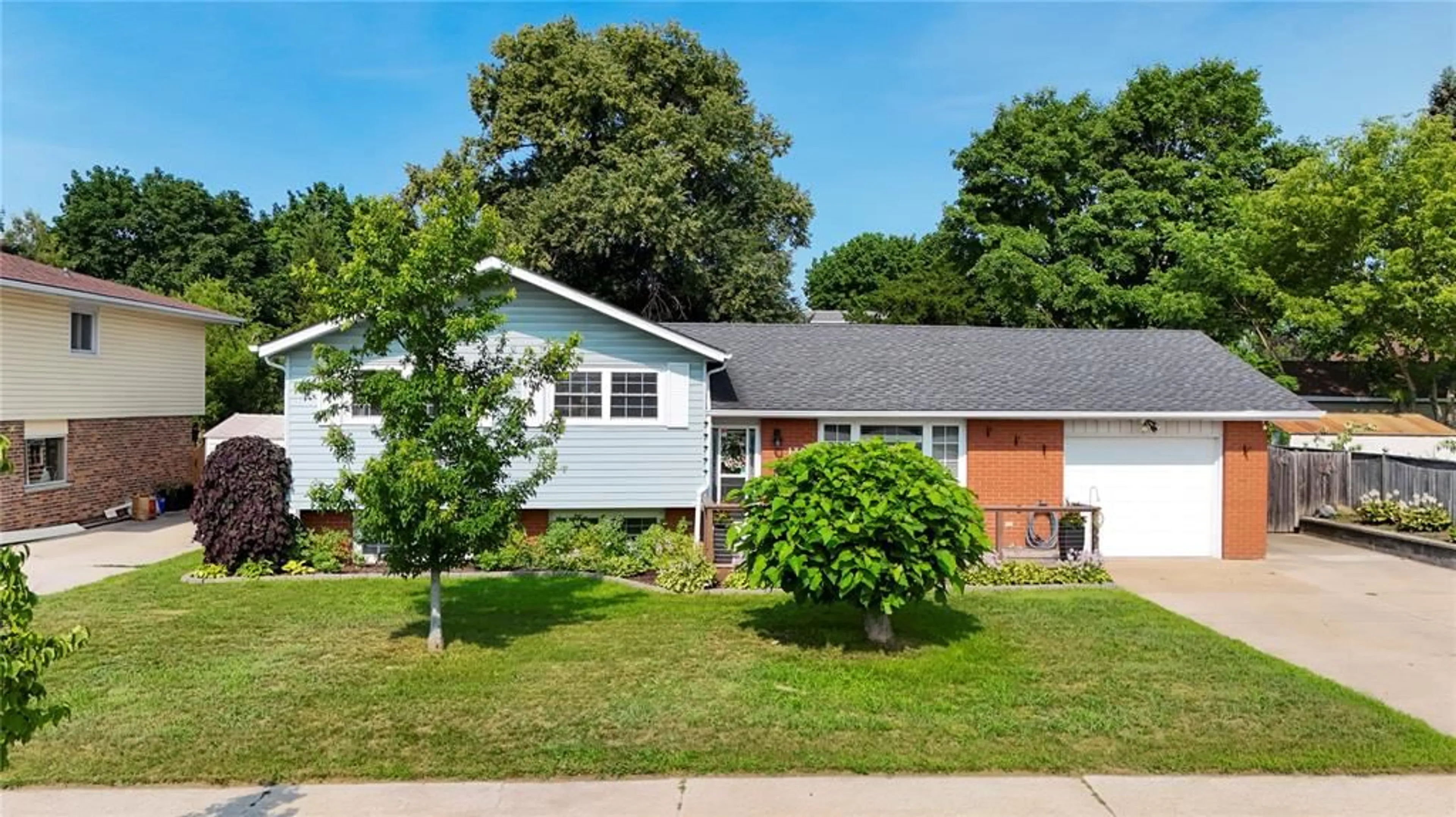 Home with vinyl exterior material, street for 1309 INDIAN Rd, Sarnia Ontario N7V 4C6