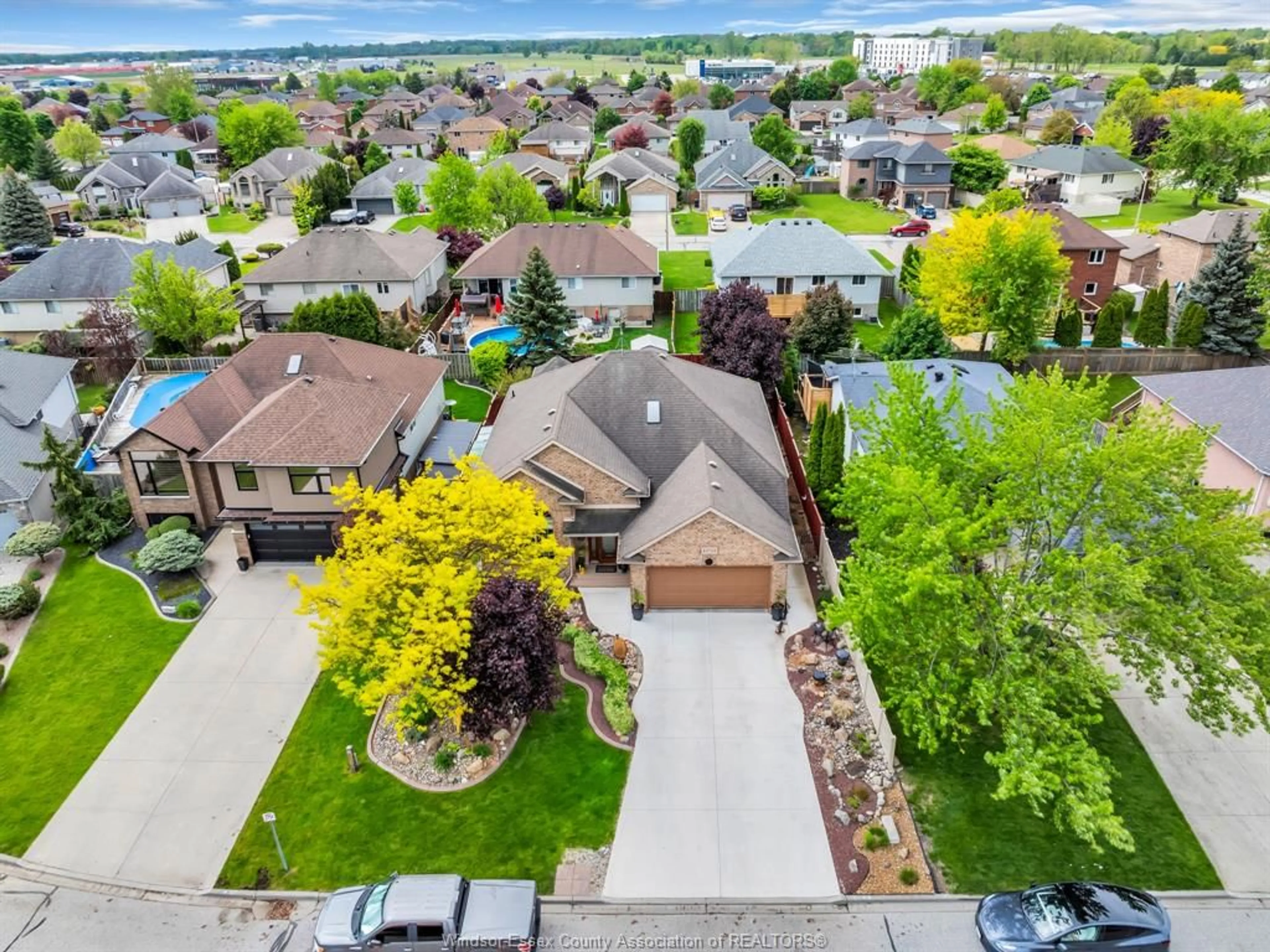 A pic from outside/outdoor area/front of a property/back of a property/a pic from drone, water/lake/river/ocean view for 12753 JACIE Crt, Tecumseh Ontario N8N 4W9