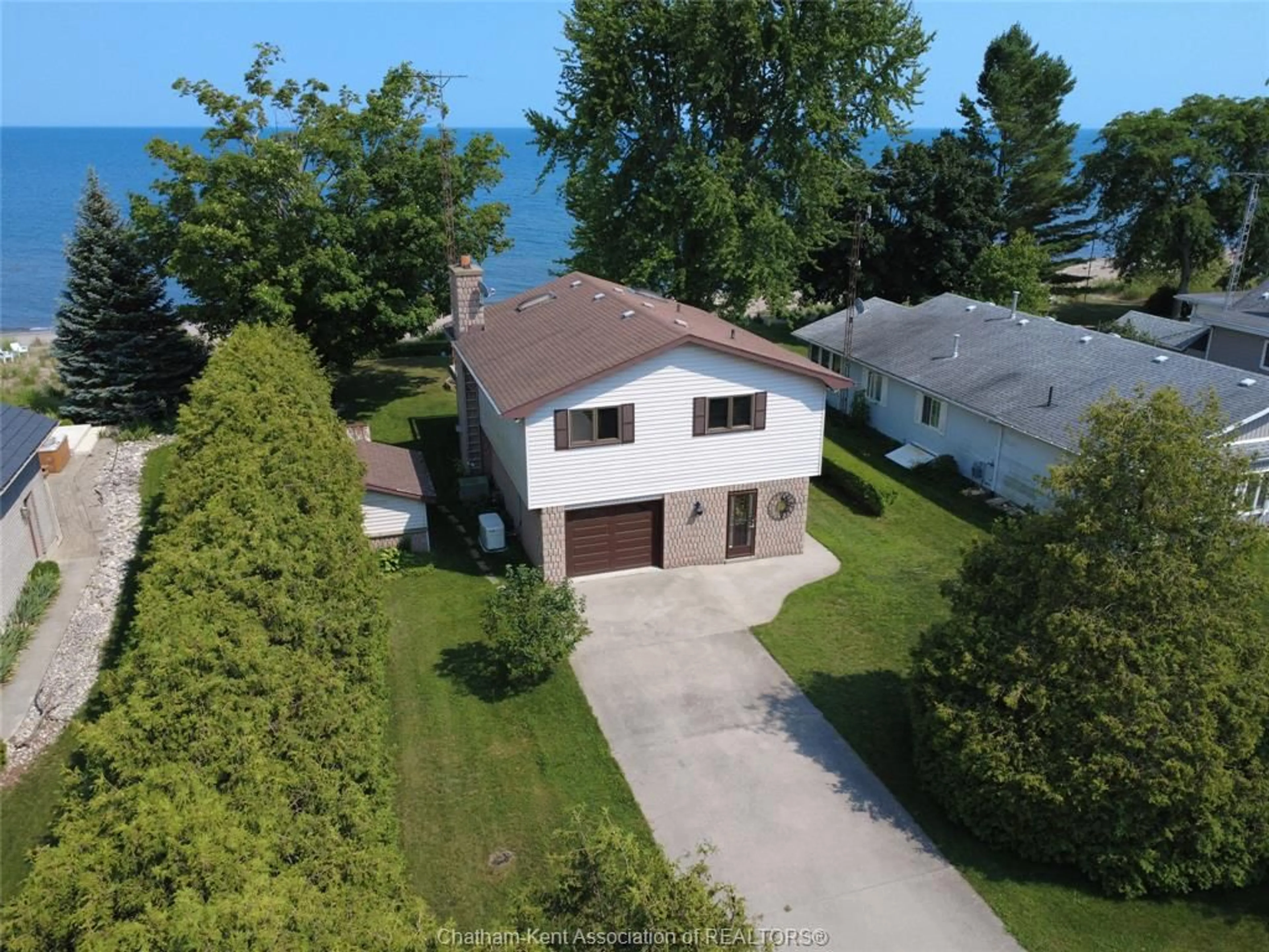A pic from outside/outdoor area/front of a property/back of a property/a pic from drone, water/lake/river/ocean view for 12040 Rose Beach Line, Morpeth Ontario N0P 1X0