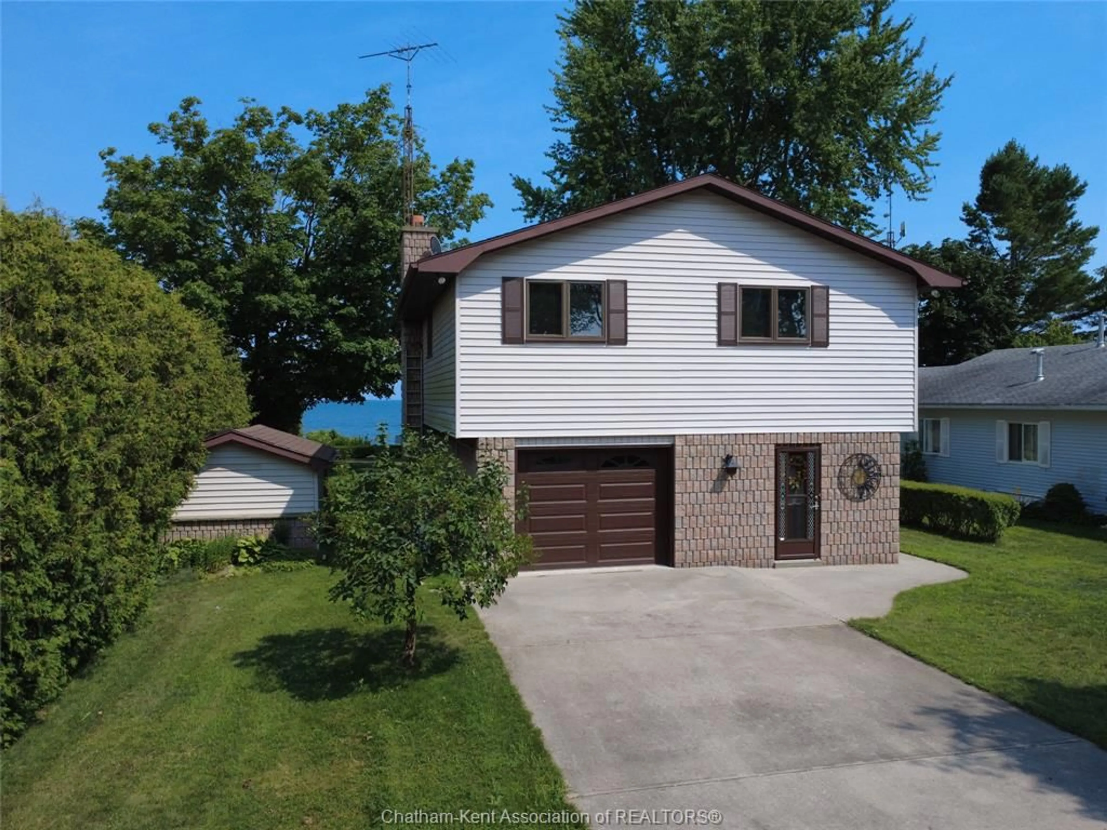 A pic from outside/outdoor area/front of a property/back of a property/a pic from drone, street for 12040 Rose Beach Line, Morpeth Ontario N0P 1X0