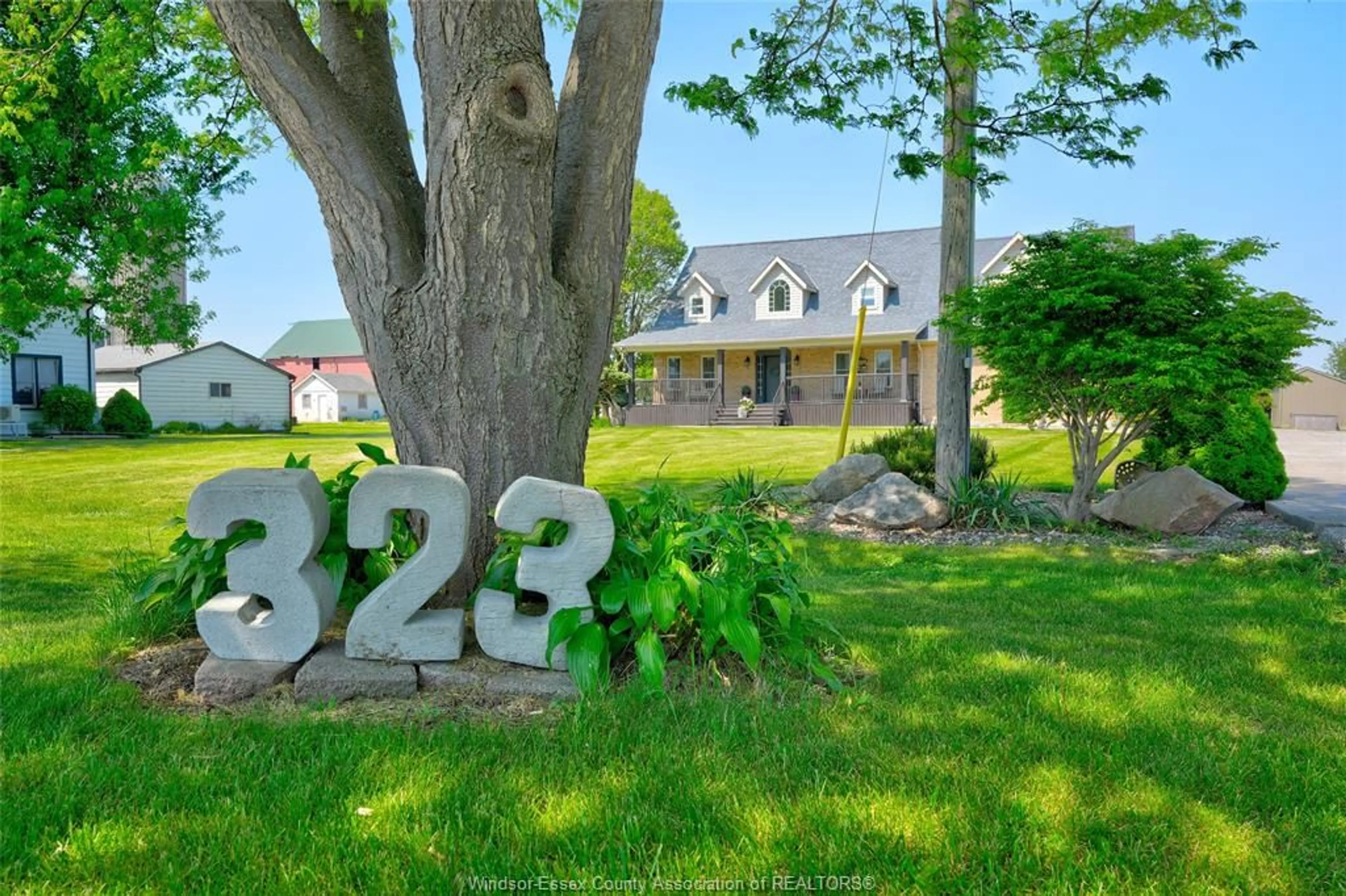 A pic from outside/outdoor area/front of a property/back of a property/a pic from drone, street for 323 COUNTY RD 27, Kingsville Ontario N0R 1V0
