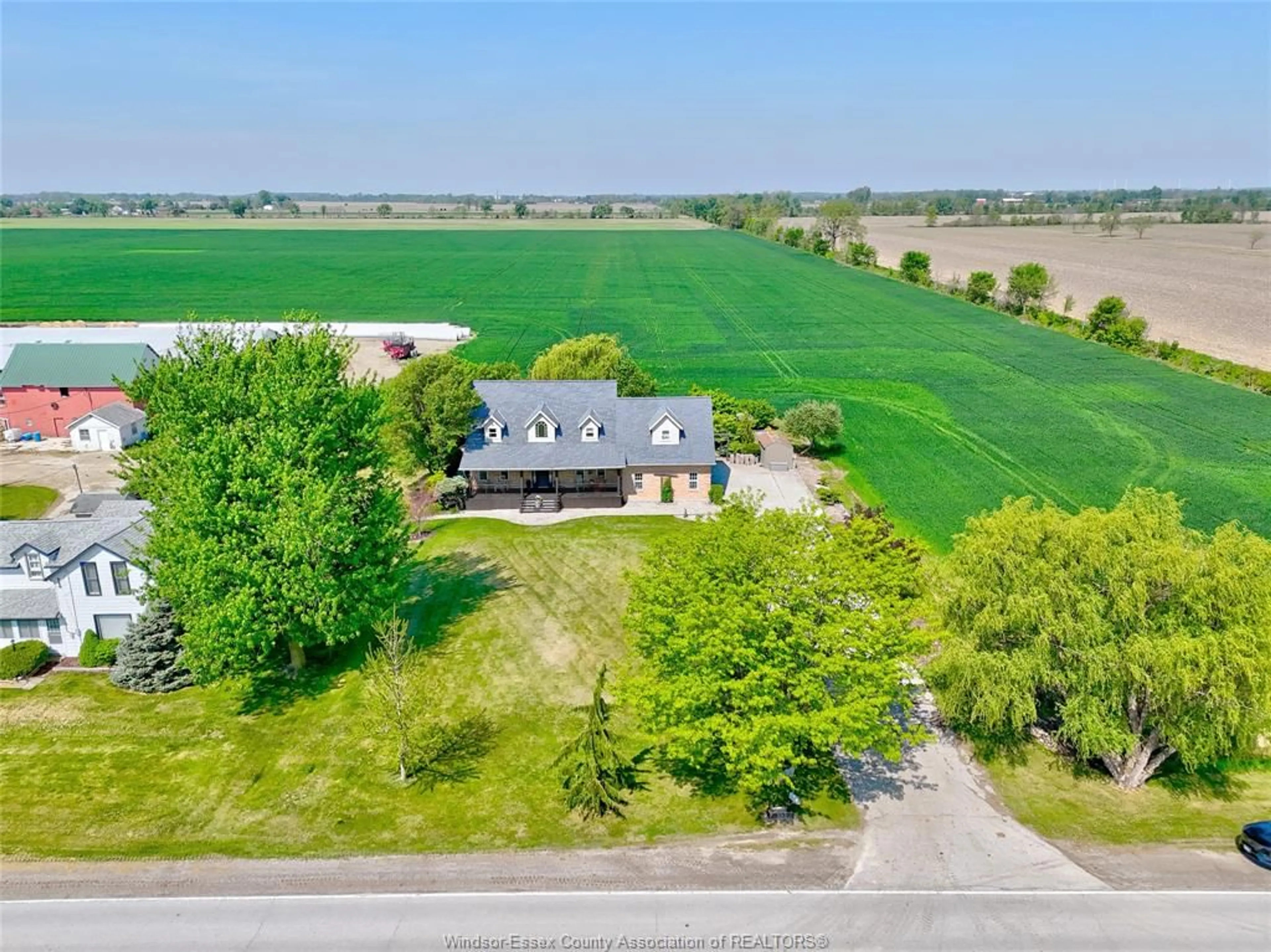 A pic from outside/outdoor area/front of a property/back of a property/a pic from drone, water/lake/river/ocean view for 323 COUNTY RD 27, Kingsville Ontario N0R 1V0