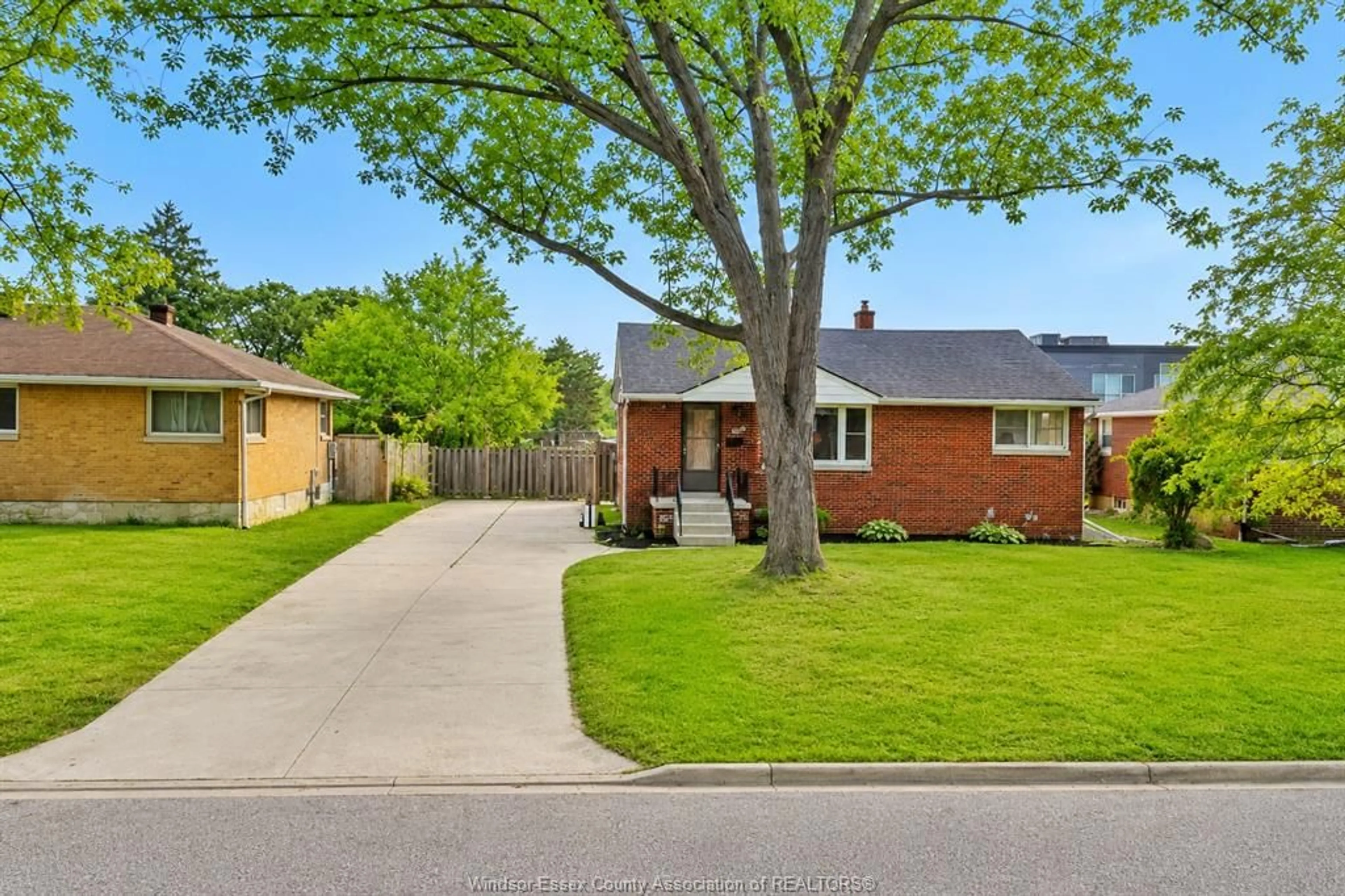 Home with brick exterior material, street for 3621 MCKAY Ave, Windsor Ontario N9E 2S3
