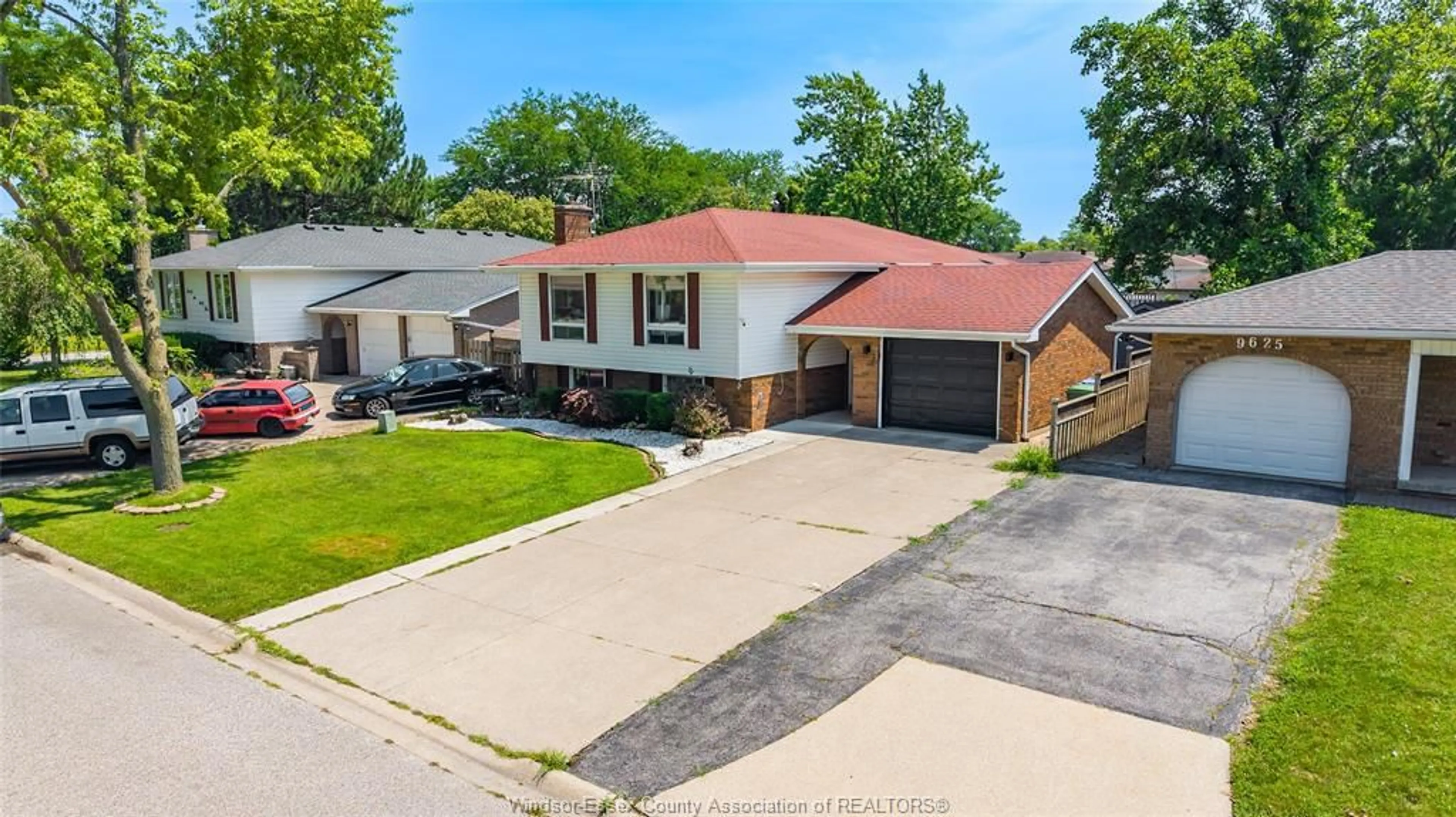 A pic from outside/outdoor area/front of a property/back of a property/a pic from drone, street for 9645 ASGARD RD., Windsor Ontario N8R 1E1