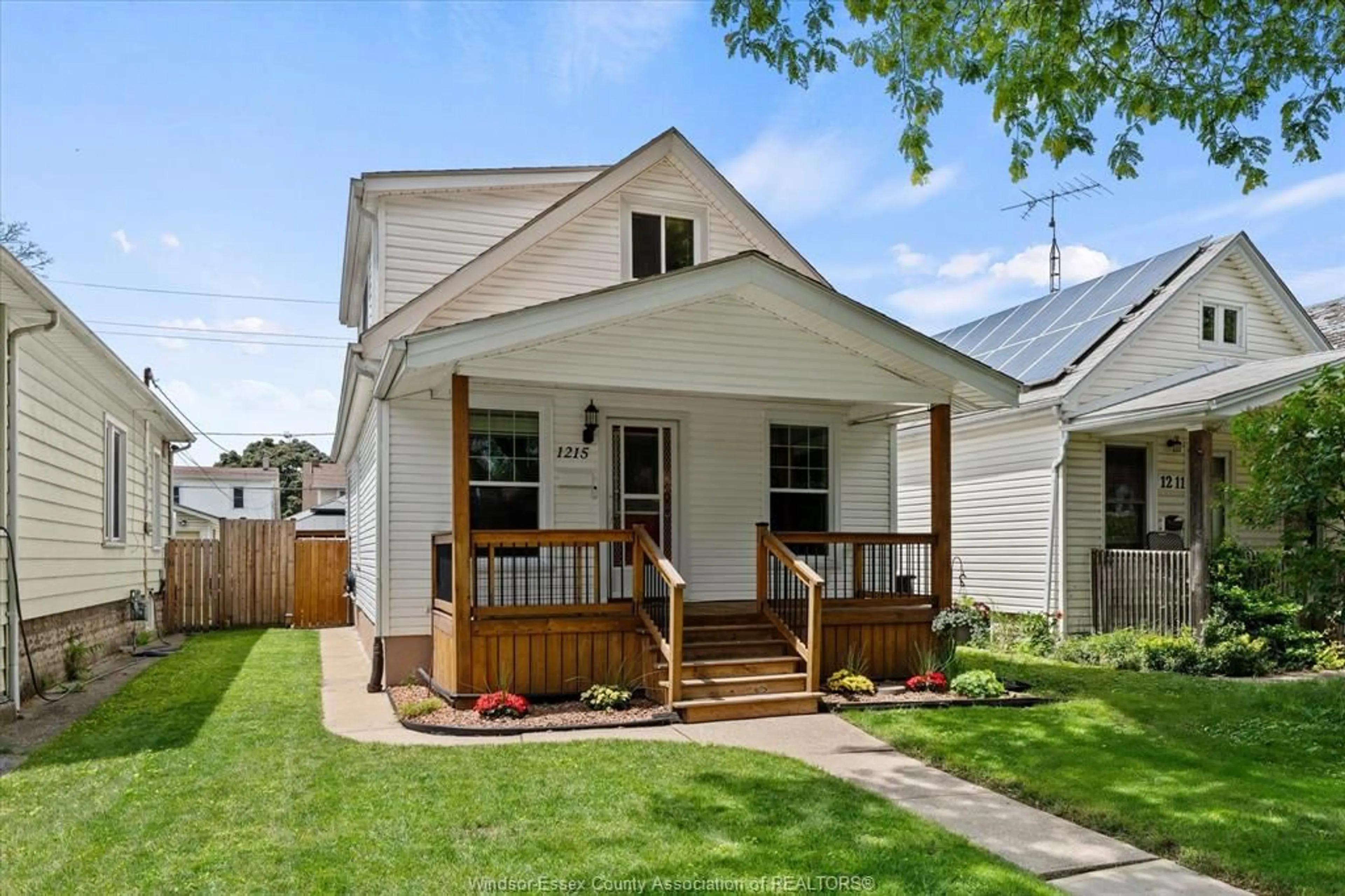 Home with vinyl exterior material, street for 1215 LINCOLN Rd, Windsor Ontario N8Y 2H9