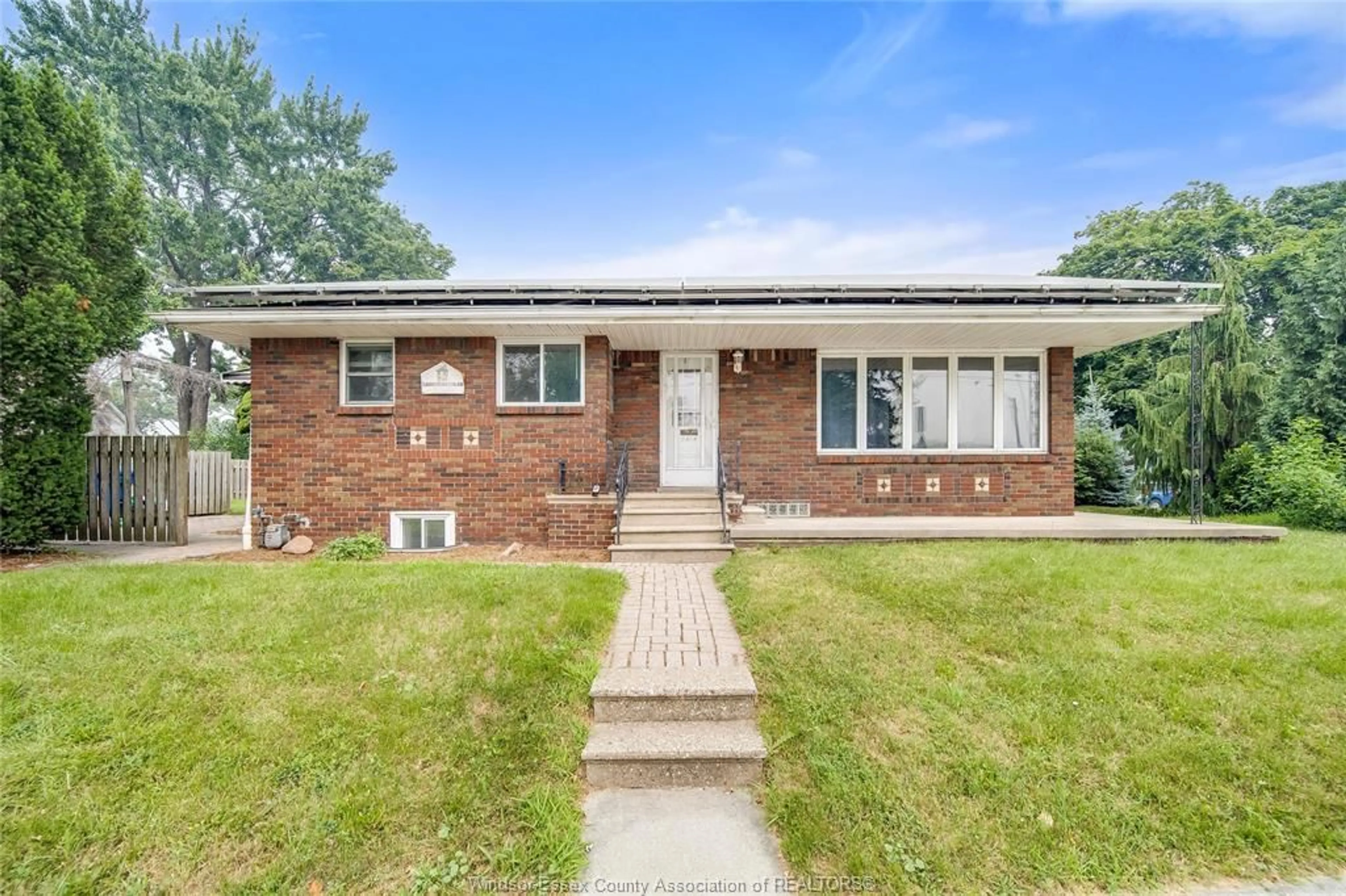Home with brick exterior material, street for 2914 WYANDOTTE St, Windsor Ontario N9C 1M4