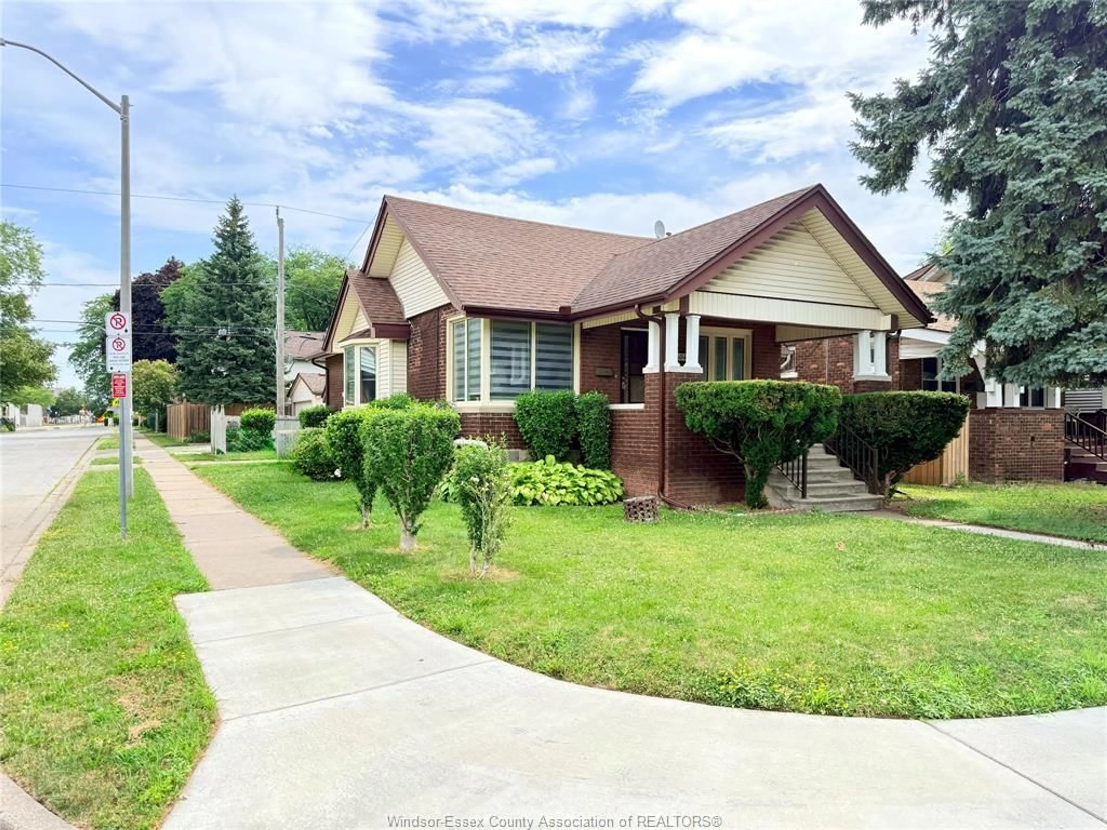 Home with brick exterior material, street for 1404 DOUGALL Ave, Windsor Ontario N8X 1R8