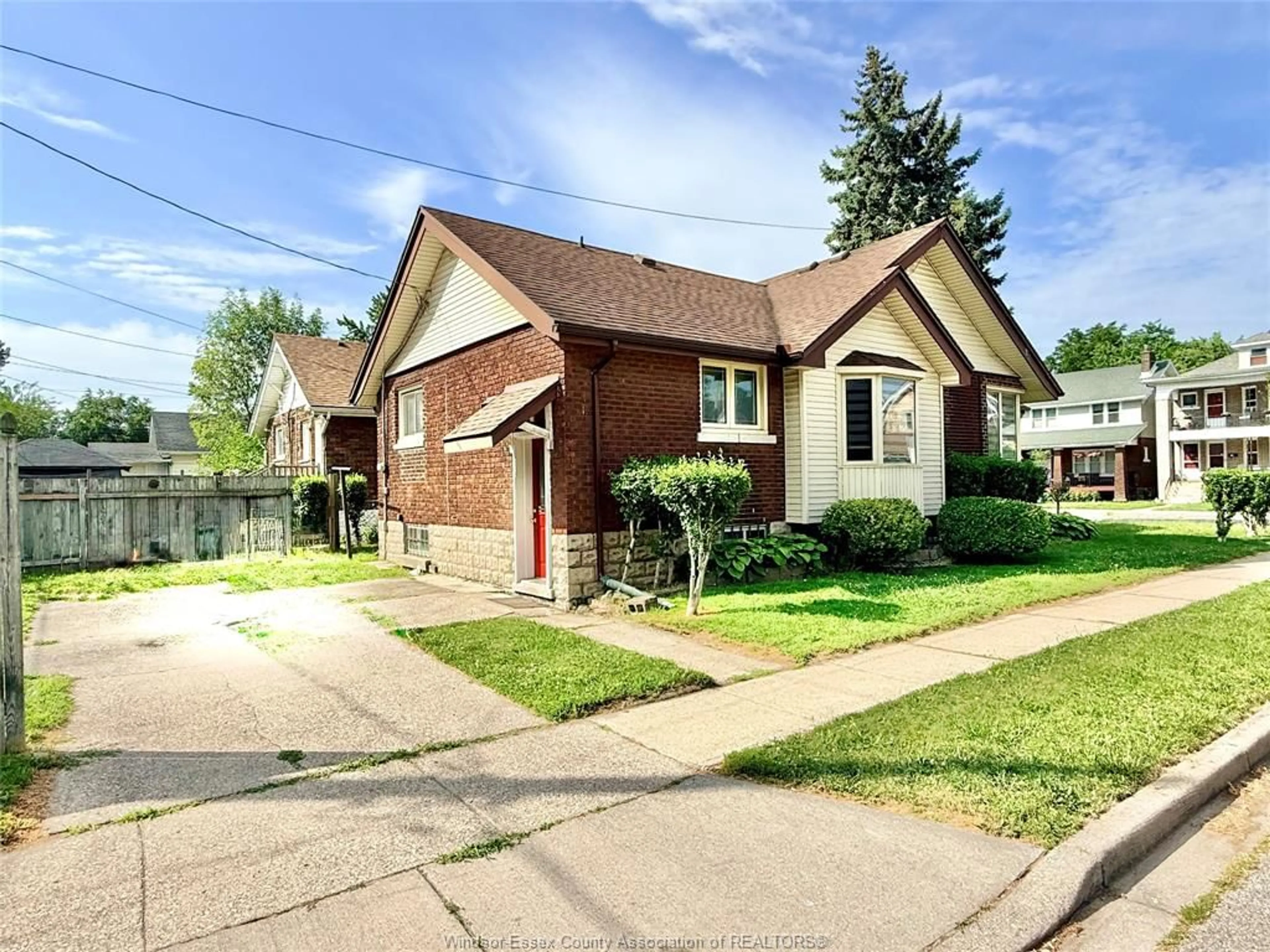 Home with brick exterior material, street for 1404 DOUGALL Ave, Windsor Ontario N8X 1R8