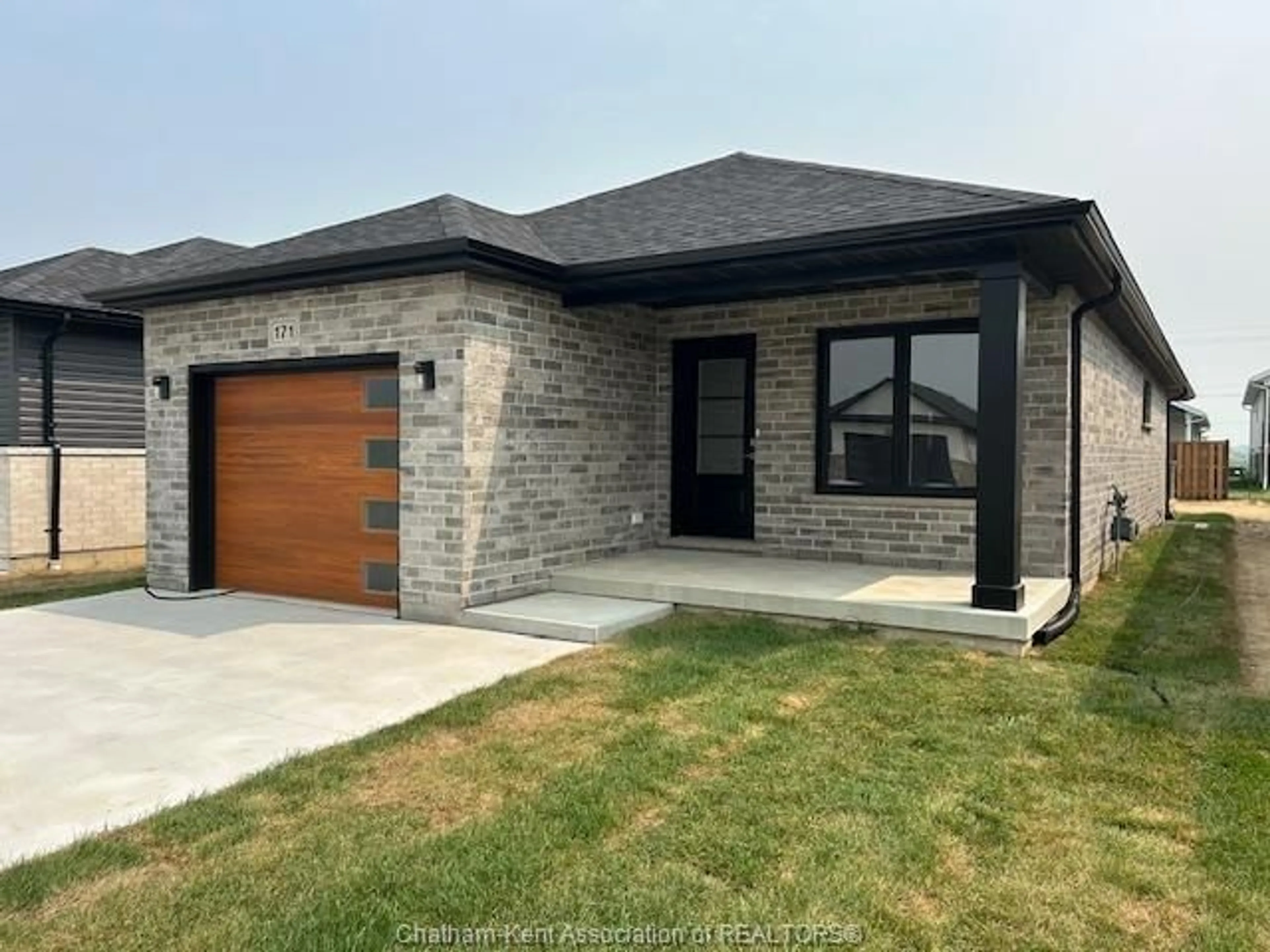 Home with brick exterior material, street for 171 IRONWOOD Trail, Chatham Ontario N7M 0T3