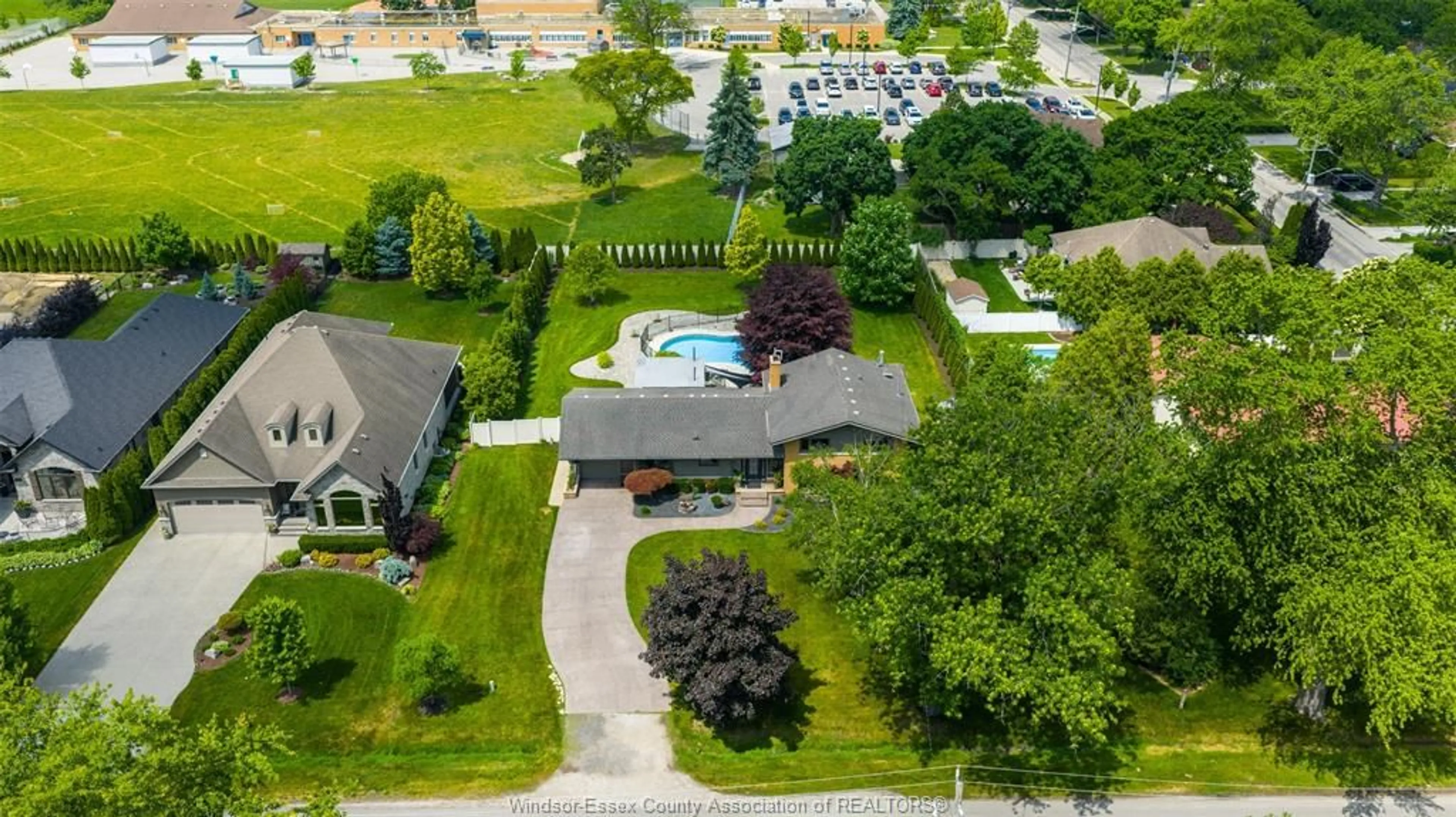 A pic from outside/outdoor area/front of a property/back of a property/a pic from drone, street for 421 Arlington, Tecumseh Ontario N8N 2K1