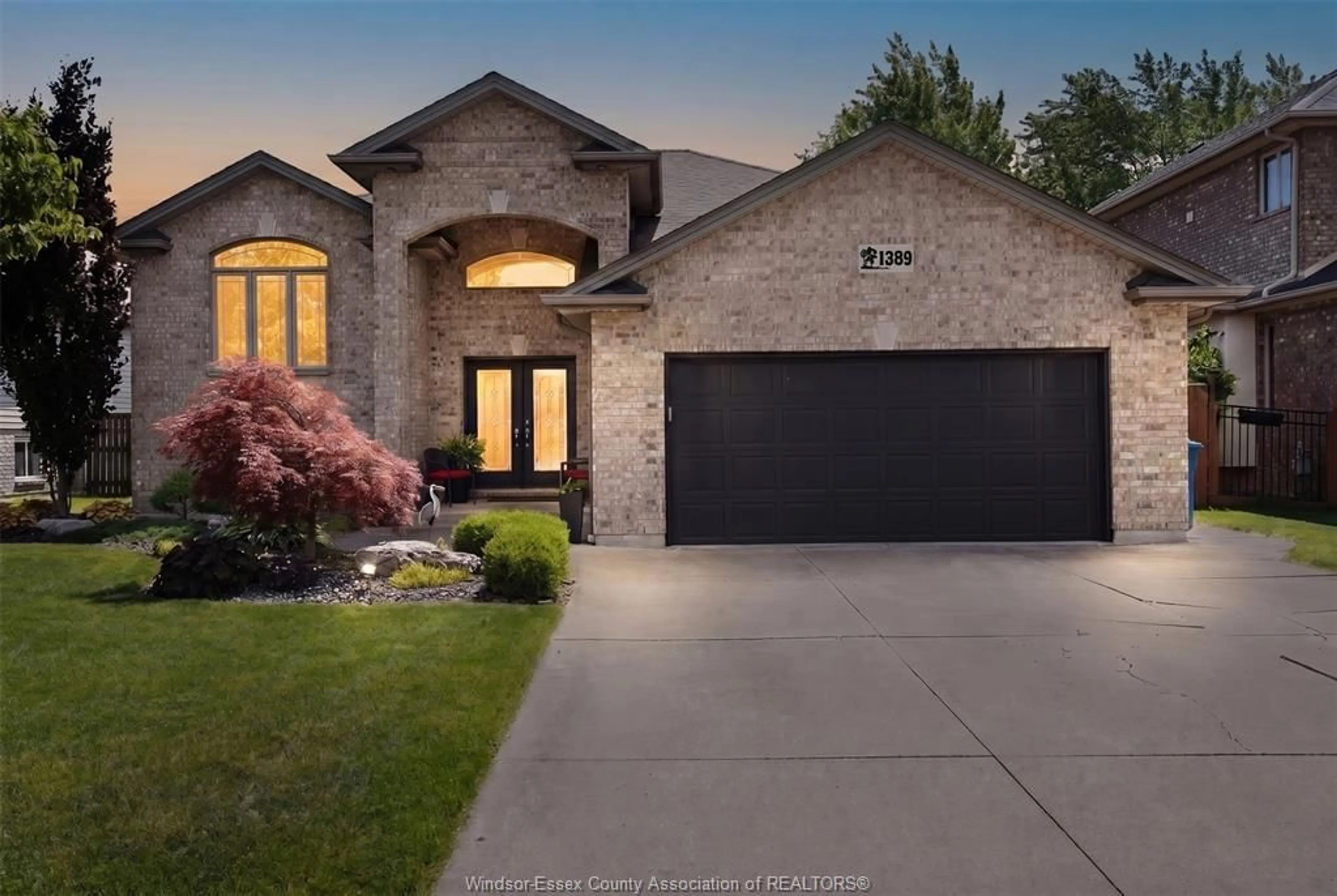 Home with brick exterior material, street for 1389 CROSSWINDS Dr, Lakeshore Ontario N8L 0S6