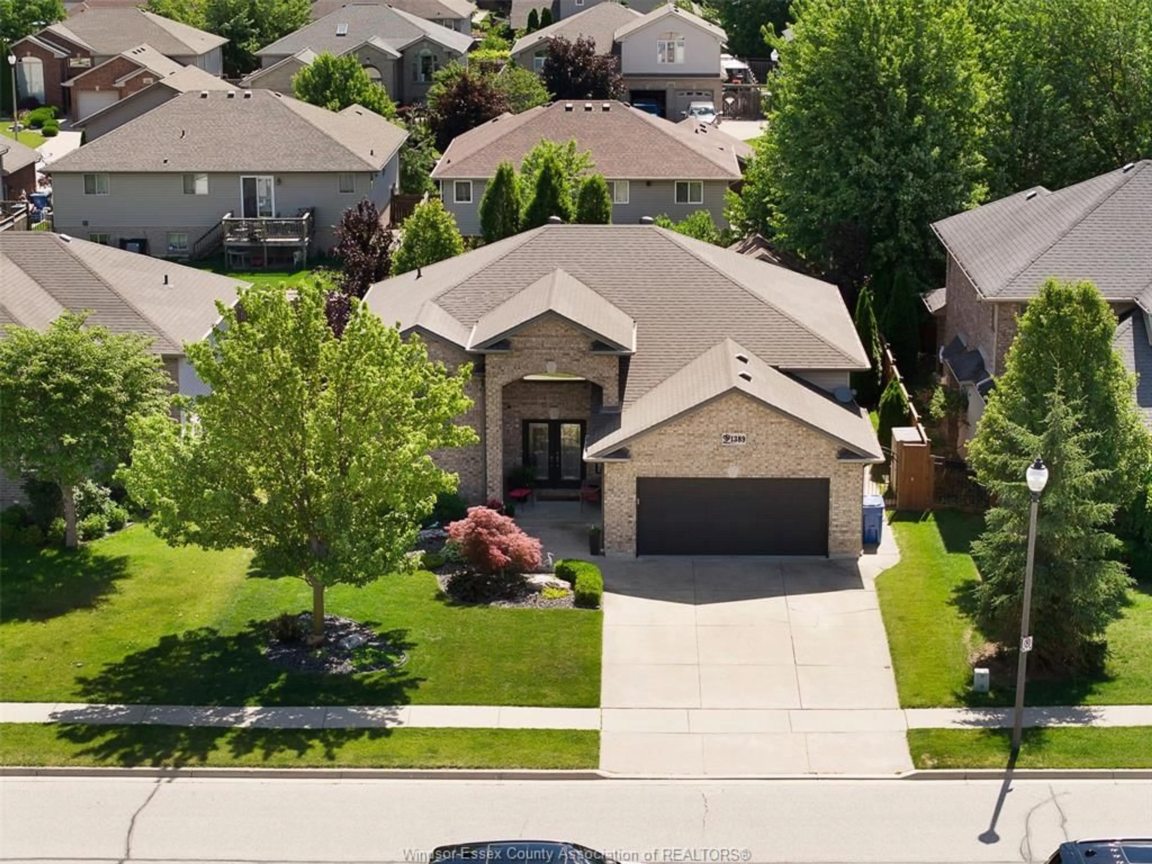 A pic from outside/outdoor area/front of a property/back of a property/a pic from drone, street for 1389 CROSSWINDS Dr, Lakeshore Ontario N8L 0S6