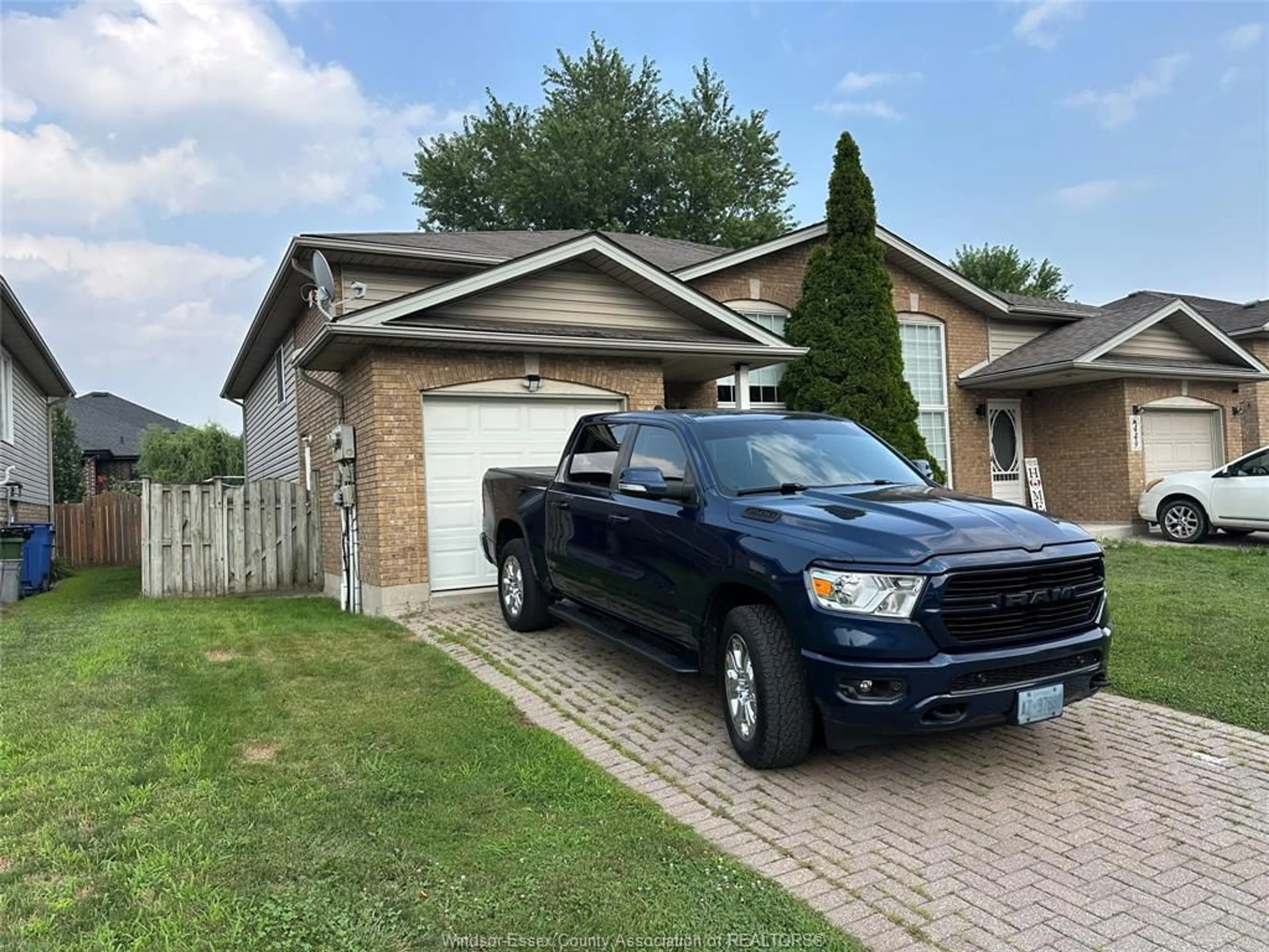 Home with brick exterior material, street for 447 MERRILL Ave, LaSalle Ontario N9J 3R2