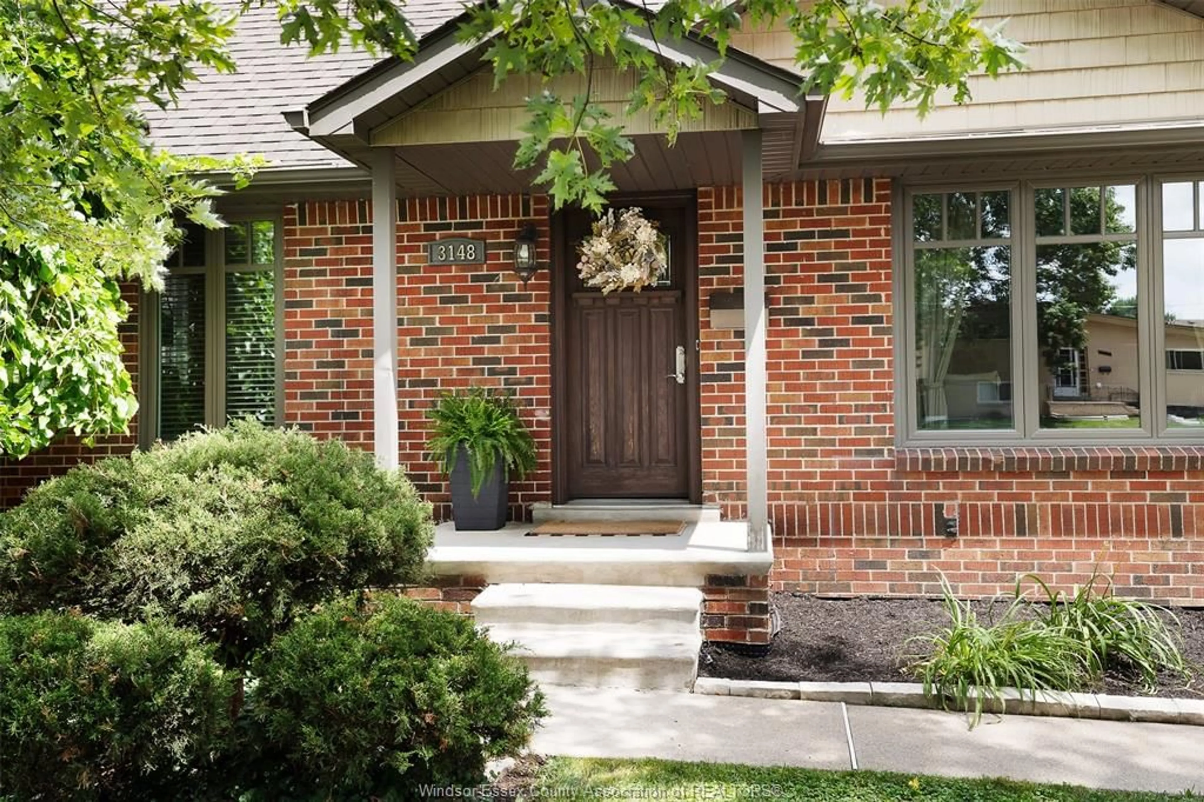 Home with brick exterior material, street for 3148 Church St, Windsor Ontario N9E 1V1
