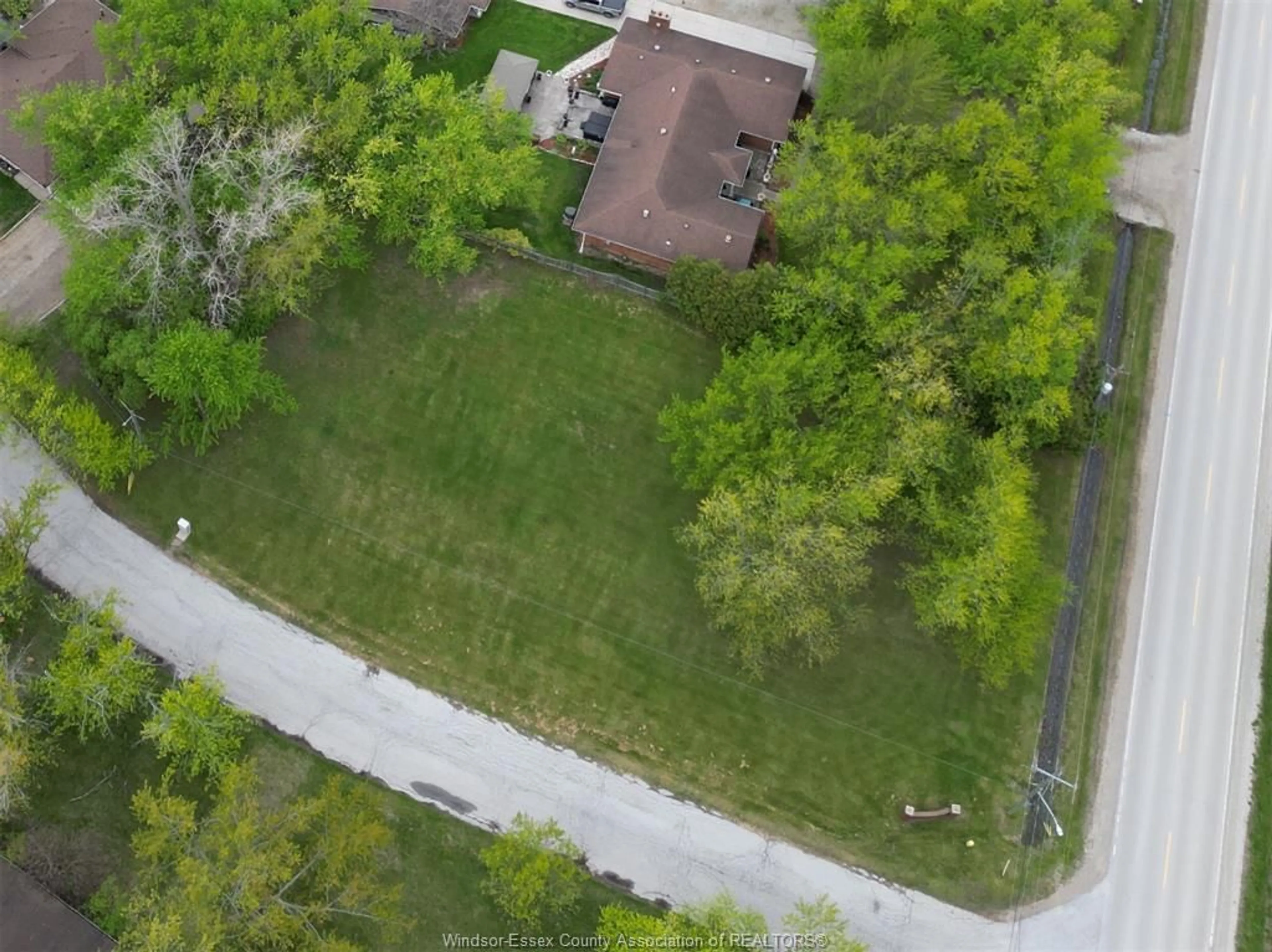 A pic from outside/outdoor area/front of a property/back of a property/a pic from drone, street for 4650-4666 CABOTO Dr, LaSalle Ontario N9H 0H2