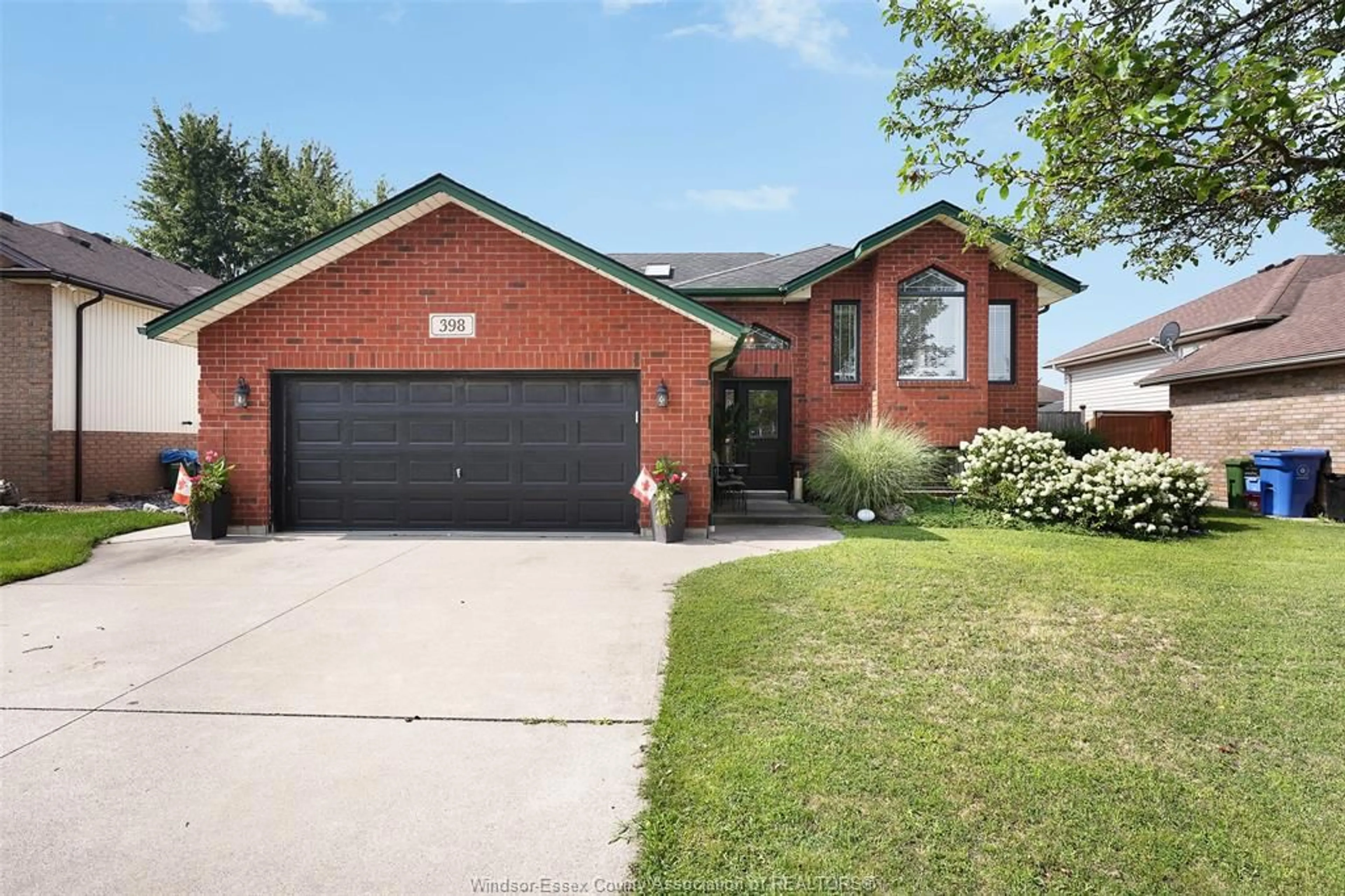 Home with brick exterior material, street for 398 International Ave, LaSalle Ontario N9J 3J4