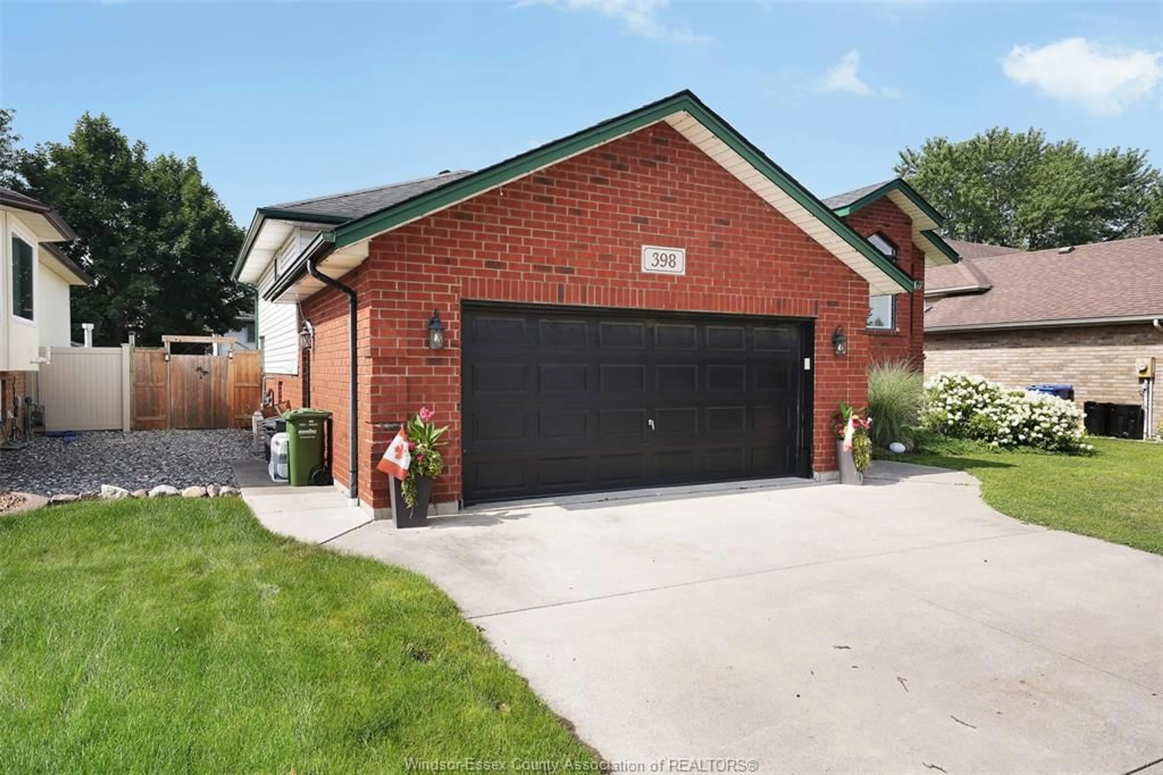 Home with brick exterior material, street for 398 International Ave, LaSalle Ontario N9J 3J4